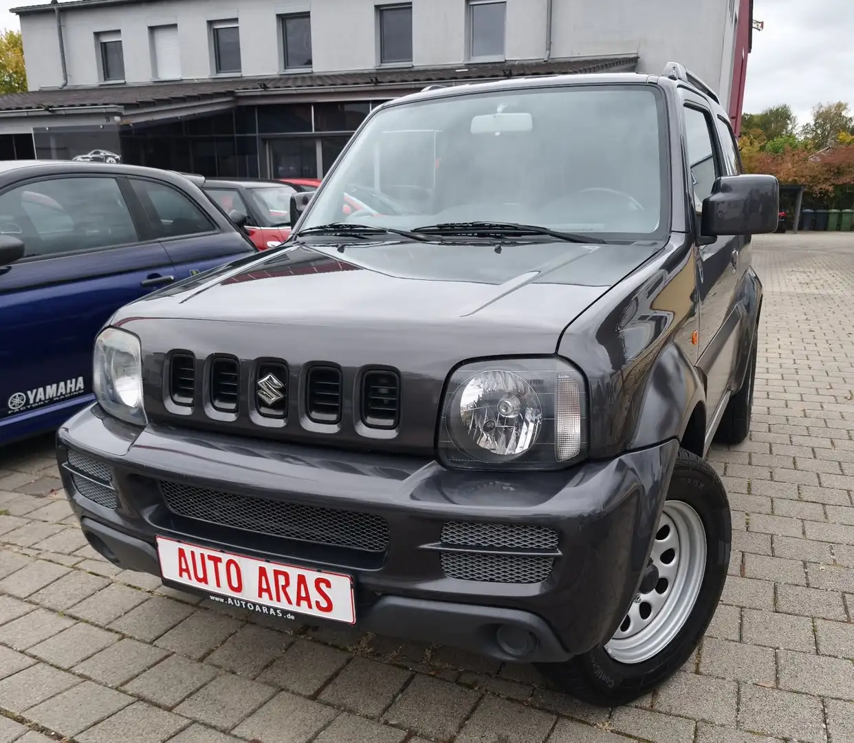 Suzuki Jimny Comfort Automatik aus 1.Hand Grau - 1