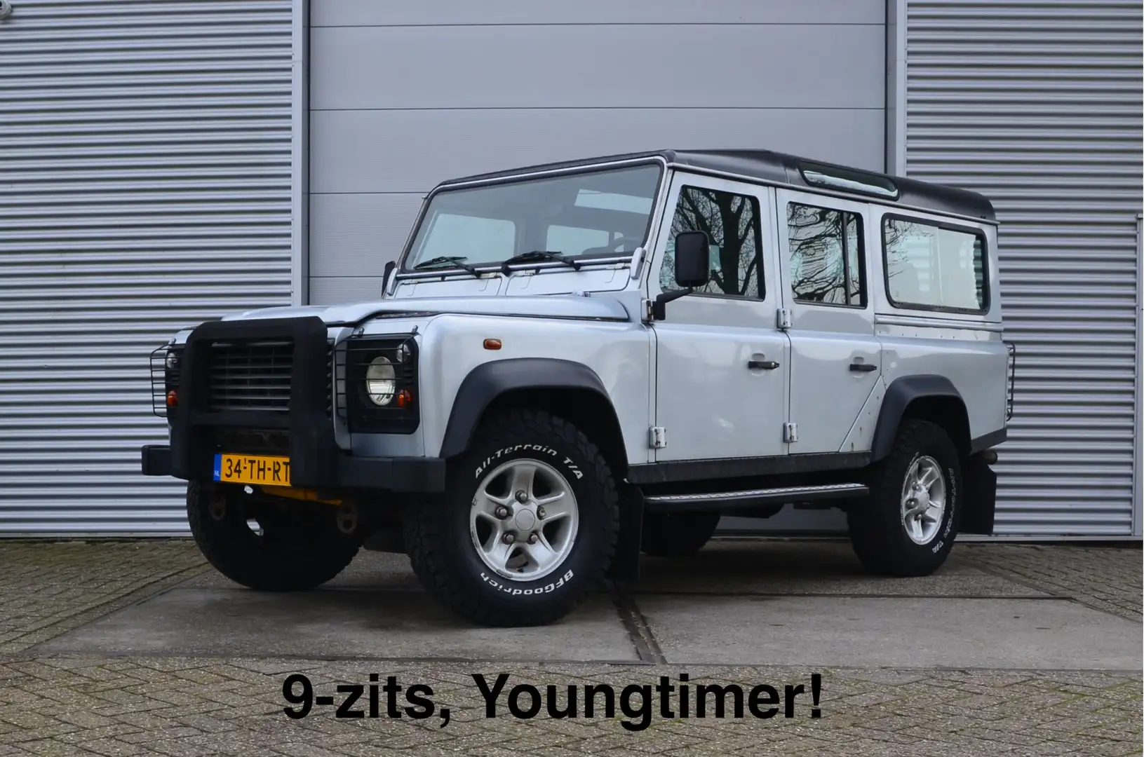 Land Rover Defender 2.5 TD5 110 SW XTech 9-zits, Youngtimer! fin. 542, Gri - 1