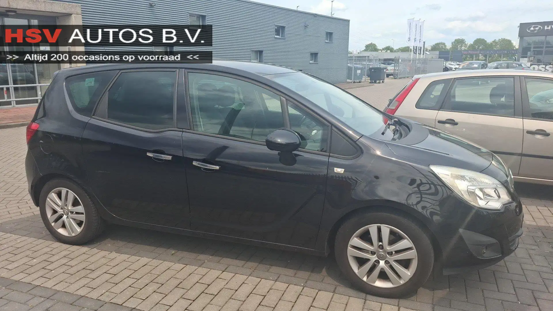 Opel Meriva 1.4 Turbo Cosmo navigatie LM 2e eigenaar Negro - 1