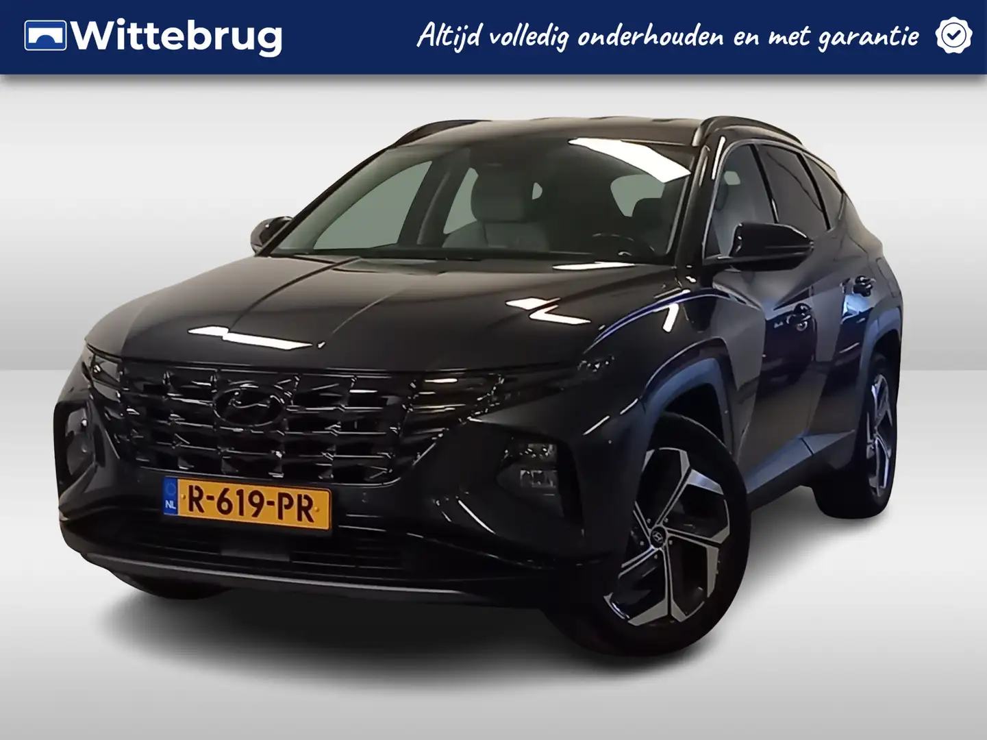 Hyundai TUCSON 1.6 T-GDI HEV Premium Full Hybride met veel luxe! Grijs - 1