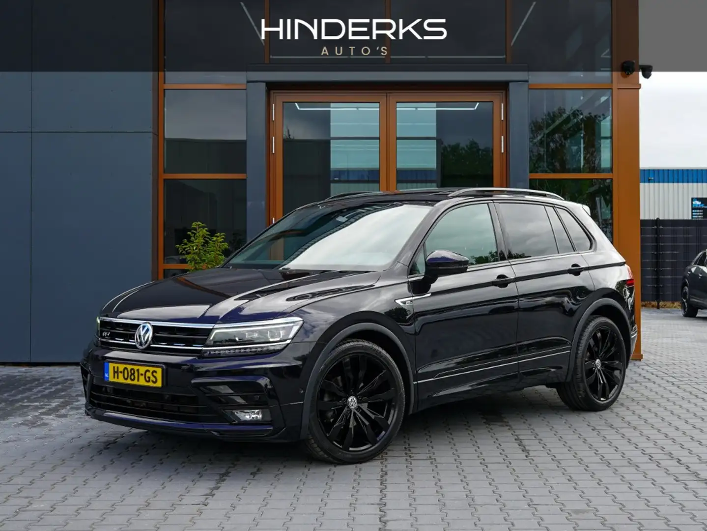 Volkswagen Tiguan 1.5 TSI Highl. Bus R | 3X R-Line | Pano | Trekhaak Zwart - 1