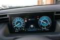 Hyundai TUCSON 1.6 T-GDI HEV PREMIUM SKY VOL LUXE KEURIGE NETTE S Gris - thumbnail 39