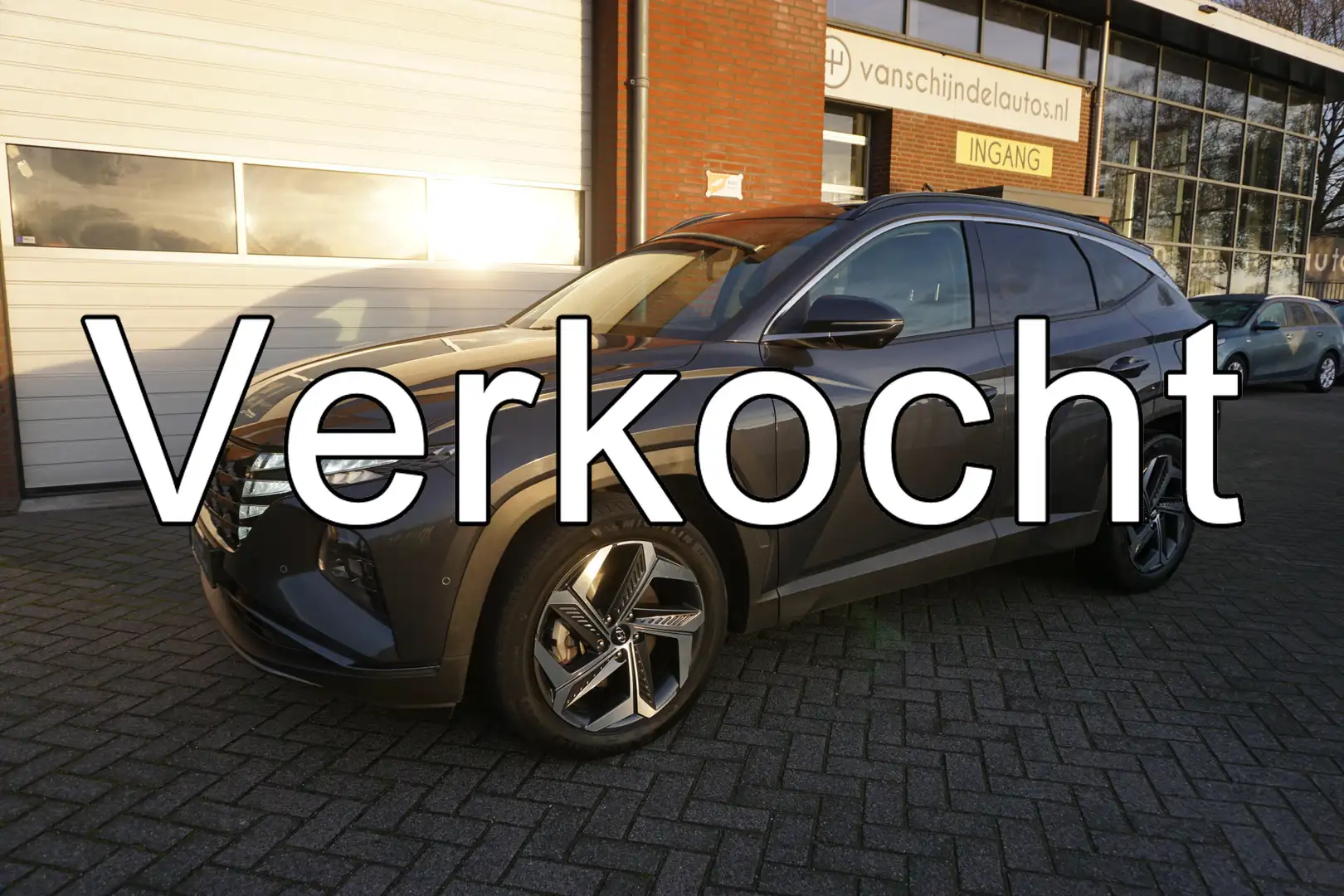Hyundai TUCSON 1.6 T-GDI HEV PREMIUM SKY VOL LUXE KEURIGE NETTE S Gris - 1