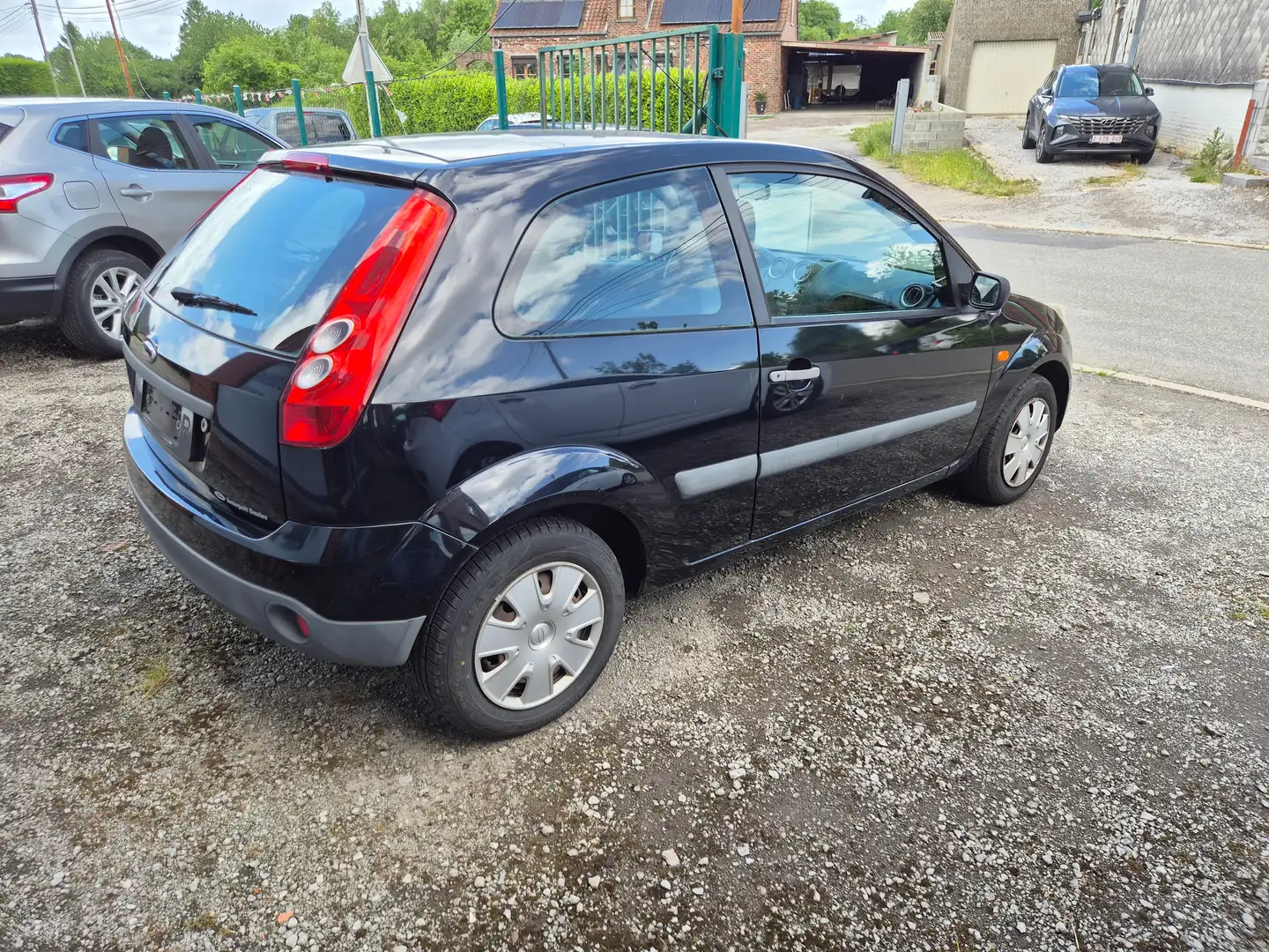 Ford Fiesta 1.3i Ambiente Zwart - 1