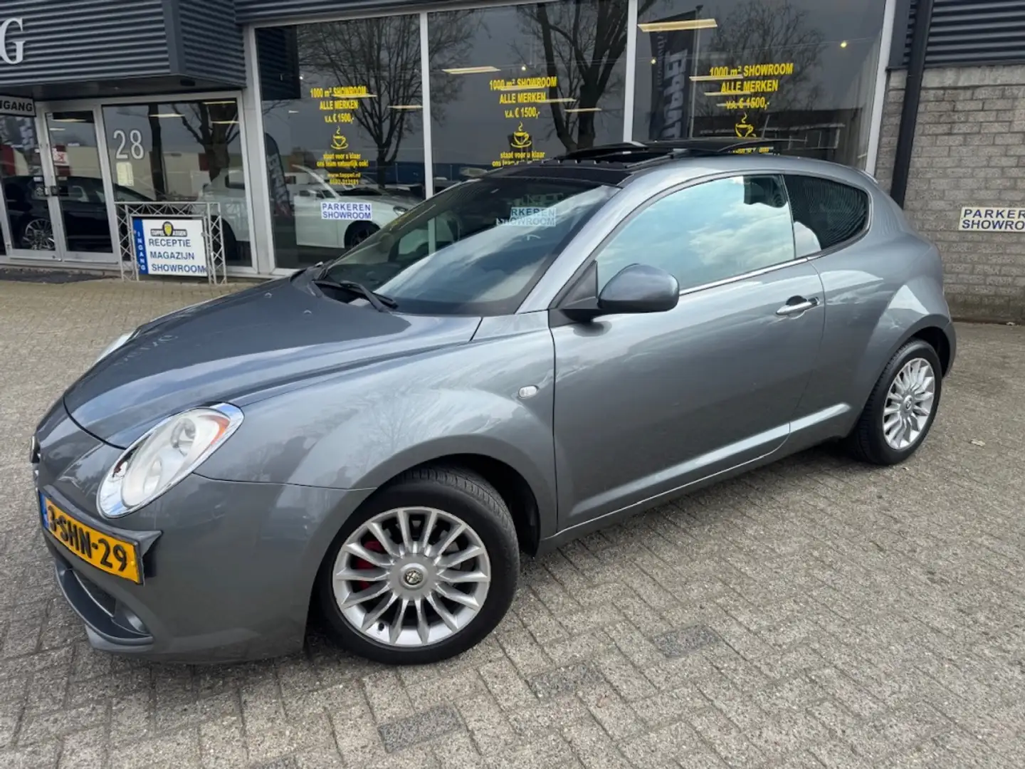 Alfa Romeo MiTo 1.3 JTDm Distinctive Leer/Nav/Stoelvw/Pano/Bose Grijs - 1