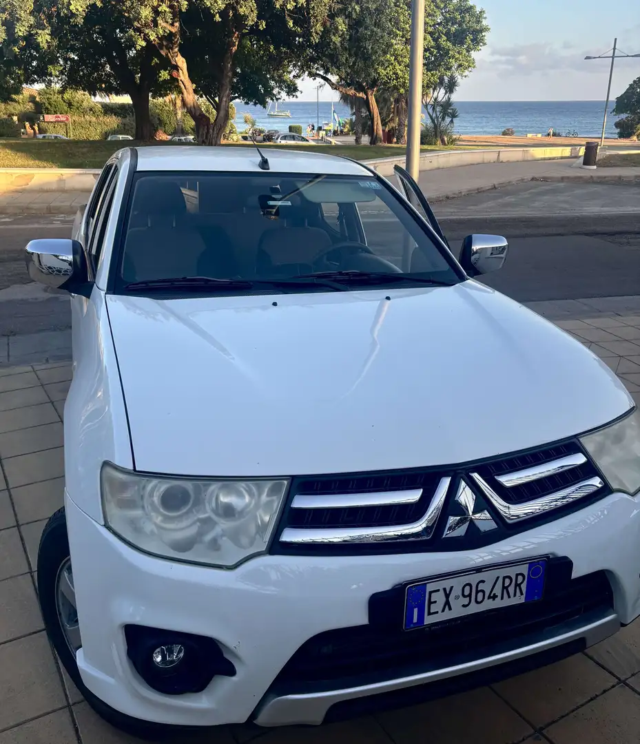 Mitsubishi L200 d.cab 2.5 di-d Insport - 1