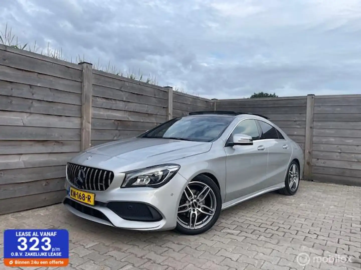 Mercedes-Benz CLA 180 AMG Ambition NAVI-PANO-LED Grijs - 1