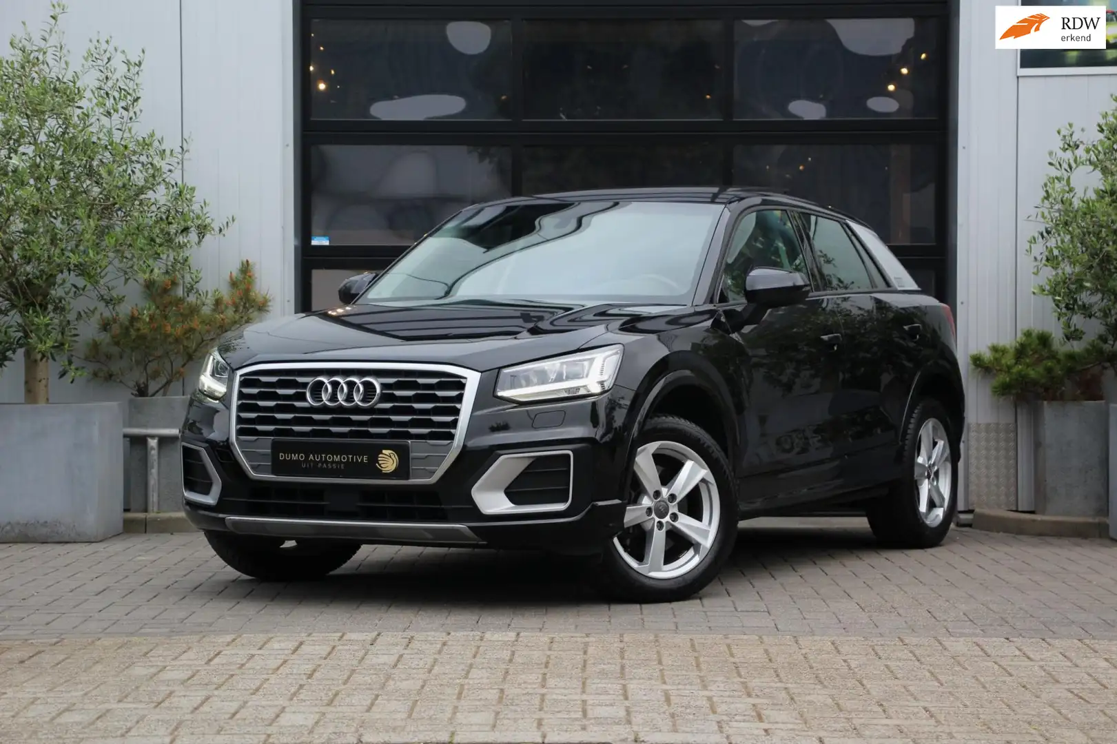 Audi Q2 1.4 TFSI Sport - LEDER - PANO - LED V&A - TREKHAAK Zwart - 1