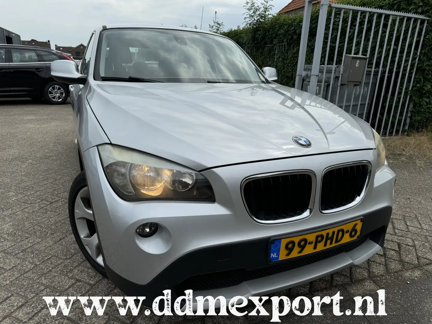 BMW X1 1.8I EXECUTIVE AUTOMAAT NAVI/CLIMATE/PDC/CLIMATE Grijs - 1