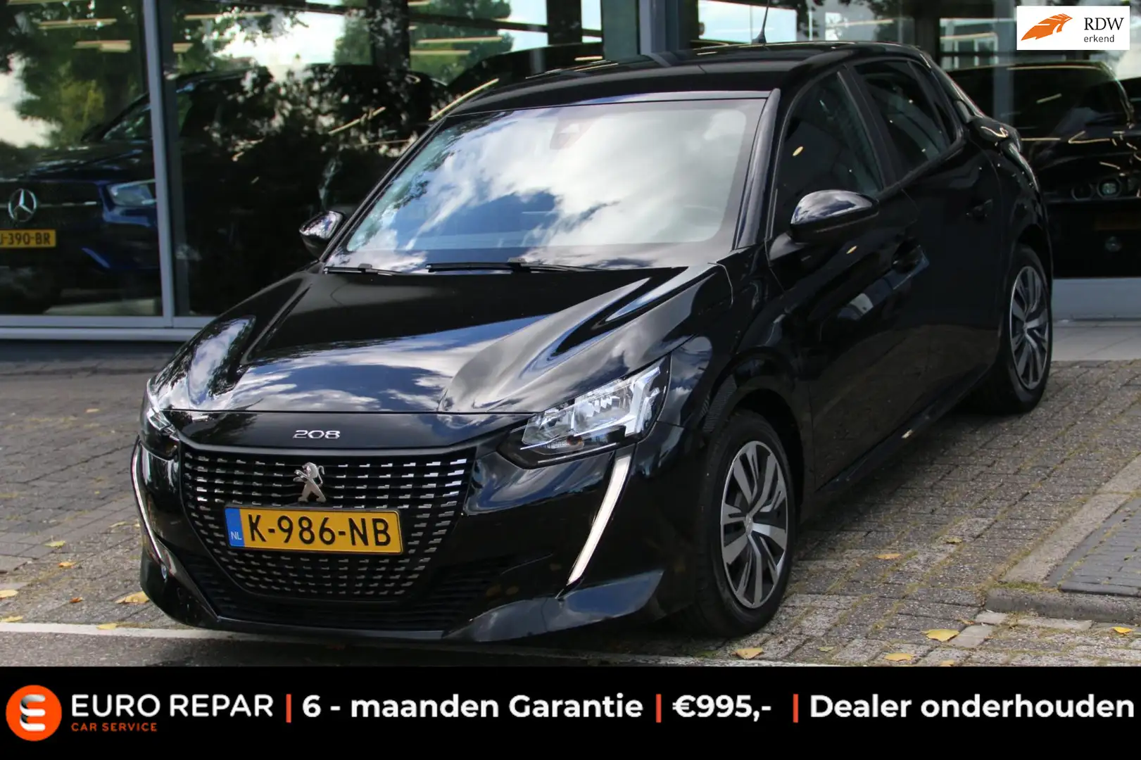 Peugeot 208 1.2 PureTech Blue Lease Allure Zwart - 1