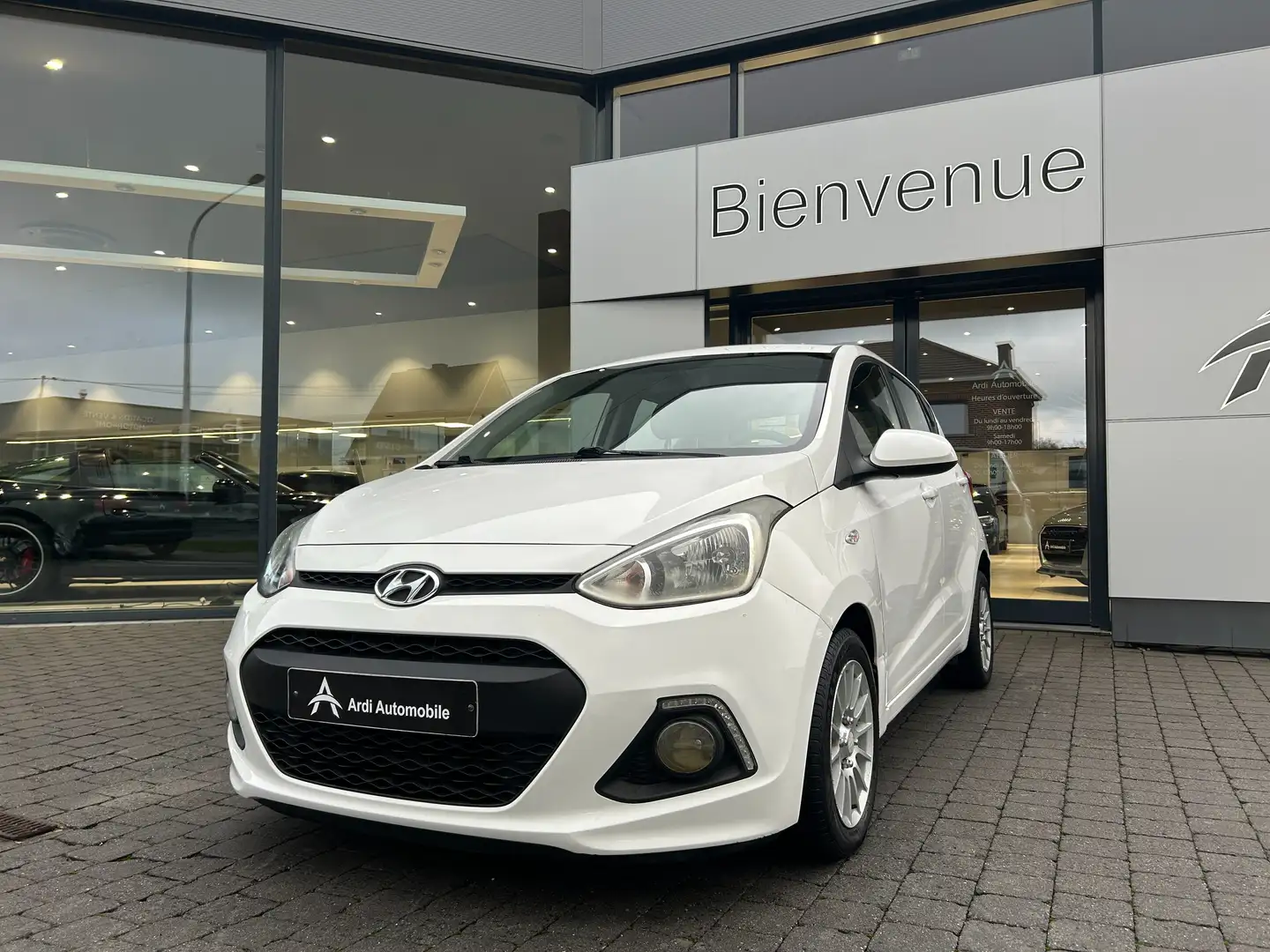 Hyundai i10 1.0i *GARANTIE 12 MOIS*AIRCO*CRUISE* Blanc - 1