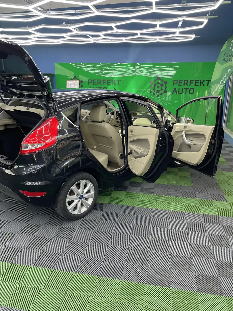 Ford Fiesta Ghia 1,25 - 1