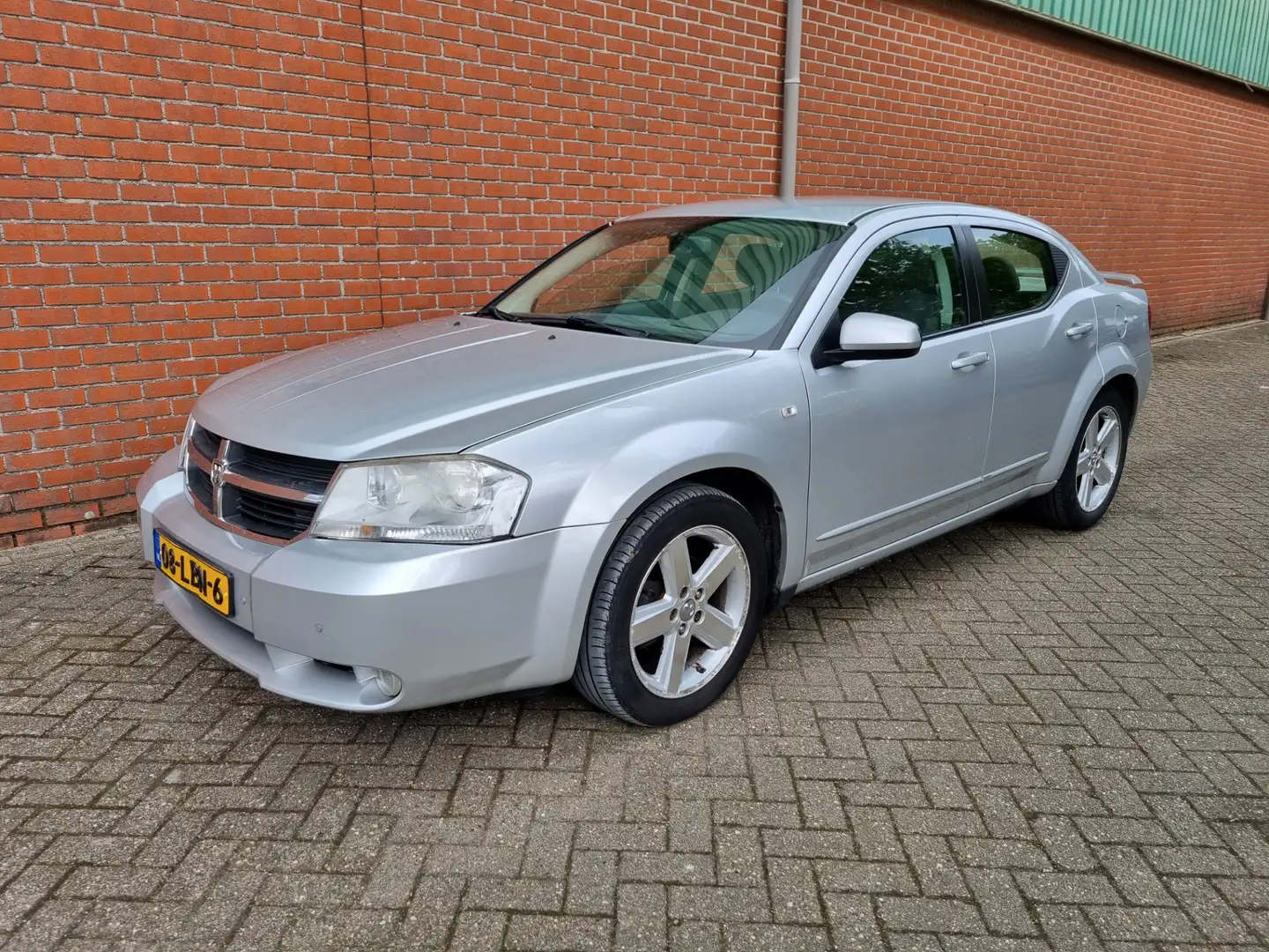 Dodge Avenger 2.0 SE NAV.+ Airco Bj:2010 NAP! Gris - 1