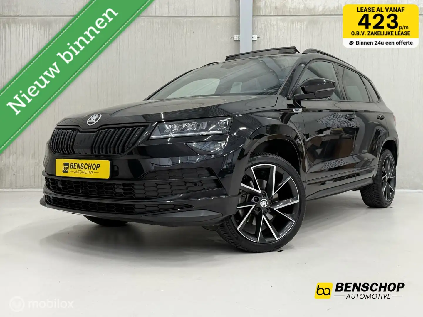 Skoda Karoq 1.5 TSI ACT Sportline Panodak Virtual Navi Carplay Zwart - 1