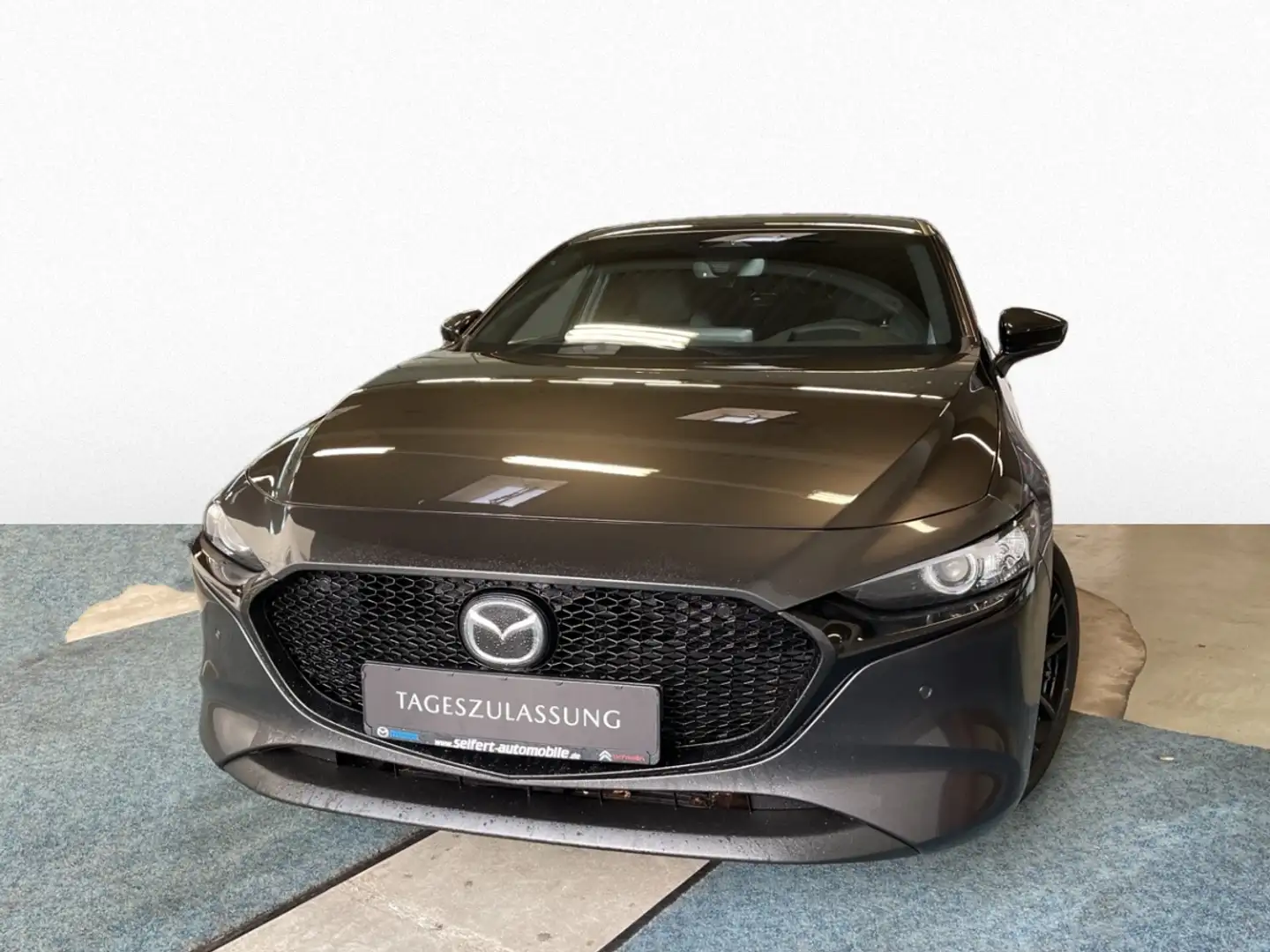 Mazda 3 (2024) 2.0L e-SKYACTIV X 186ps 6AT Homura Tageszul Gris - 1