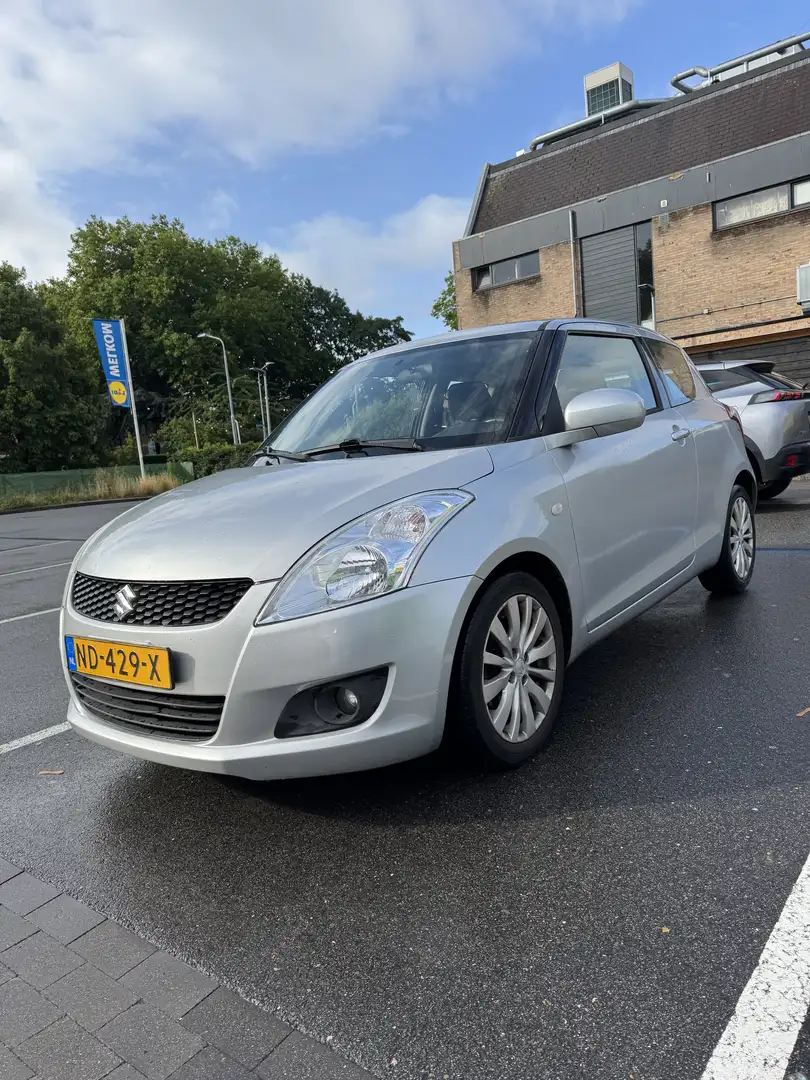 Suzuki Swift 1.2 Grijs - 1