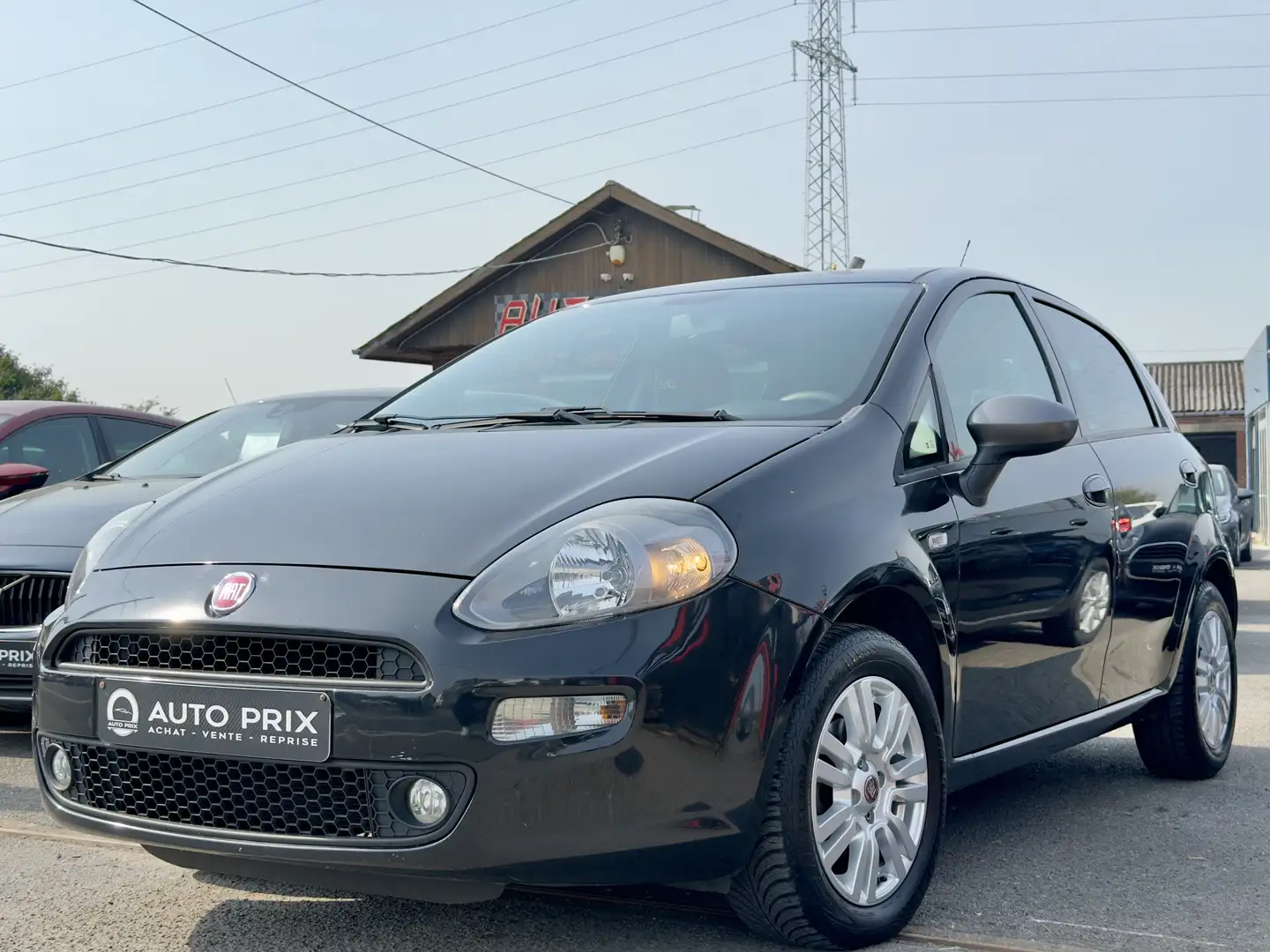 Fiat Punto 1.2i Young II Navi PDC Clim Euro 6b Negro - 1