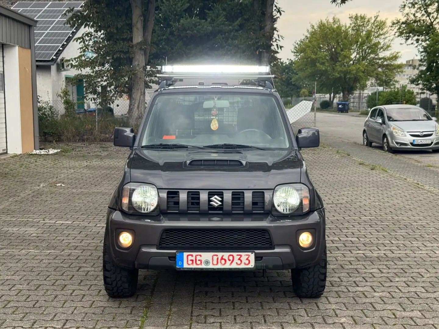 Suzuki Jimny Ranger Style LiM. 4X4 OFFROAD 1-HAND EURO6 Grau - 1