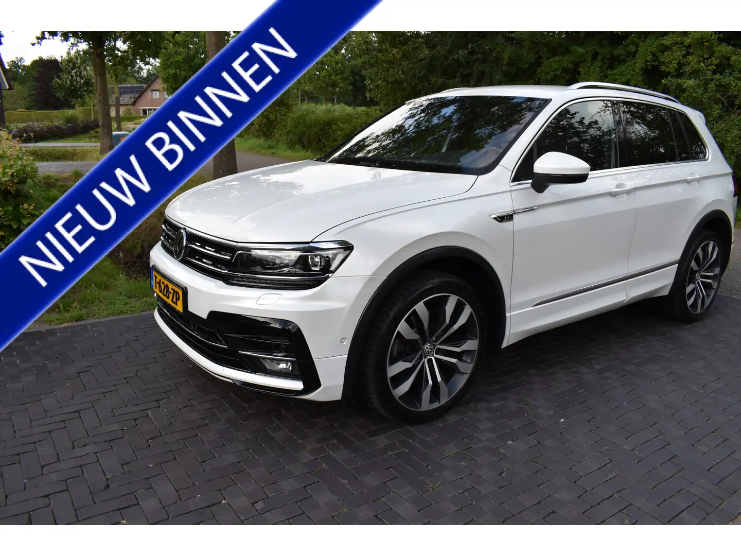 Volkswagen Tiguan 2.0 TSI 4WD R-LINE 221PK AUT, LEER, ADAPT. TREKH. White - 1