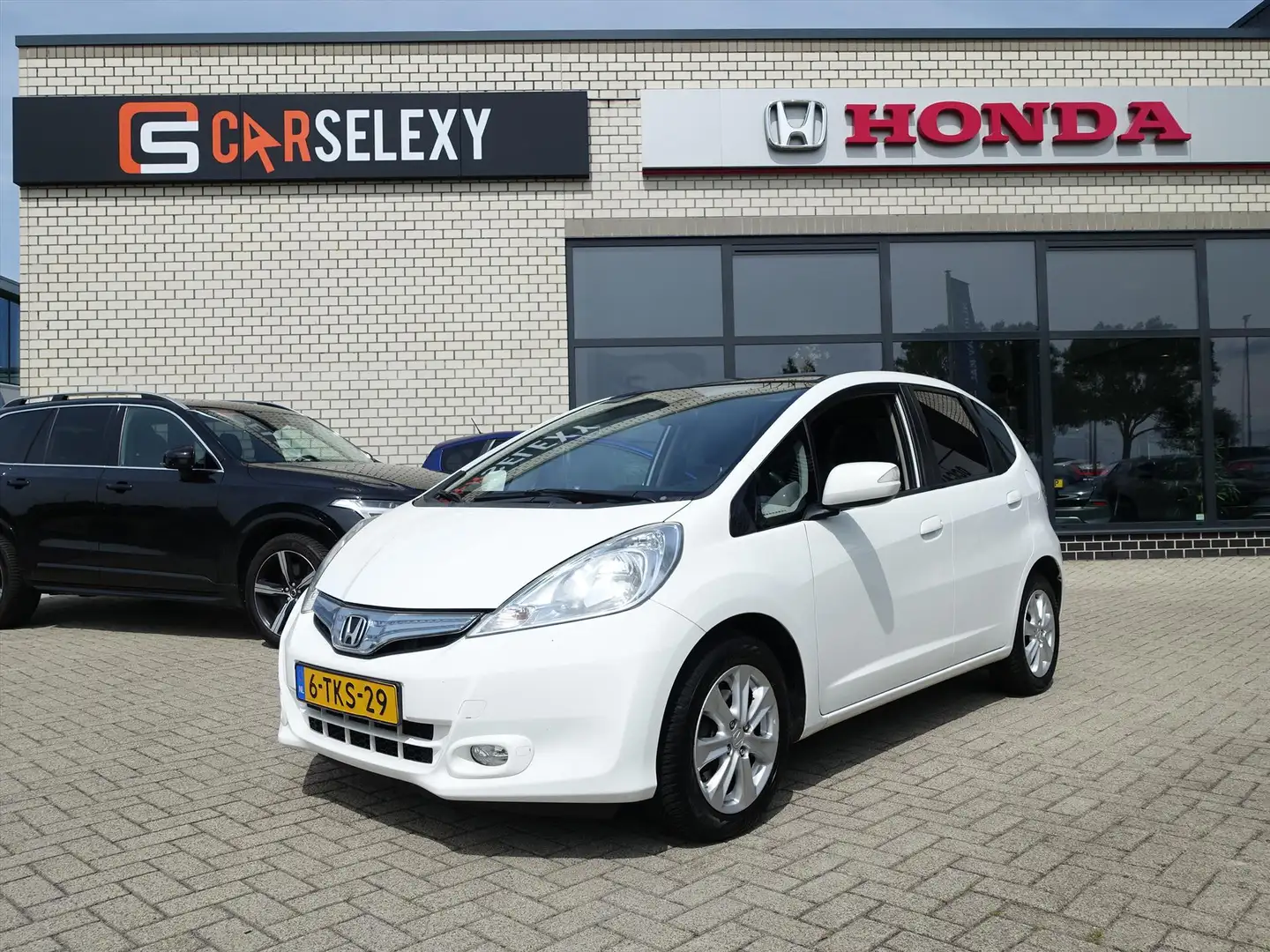 Honda Jazz Hybrid 1.4 i-VTEC 102pk CVT Elegance Trekhaak 4 Se Wit - 1
