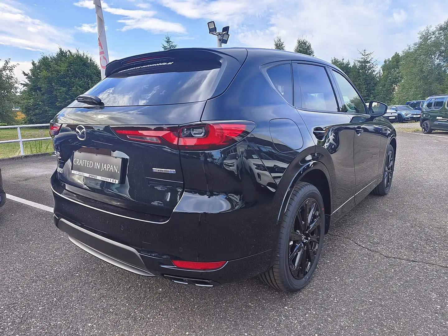 Mazda CX-60 2.5L e-SKYACTIV PHEV AWD HOMURA PLUS Automatik ... Schwarz - 2