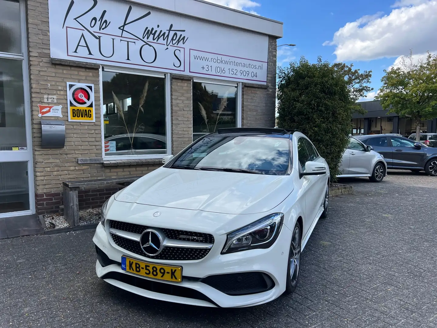 Mercedes-Benz CLA 180 Ambition AMG-Line Panoramadak / automaat / Navigat Wit - 1