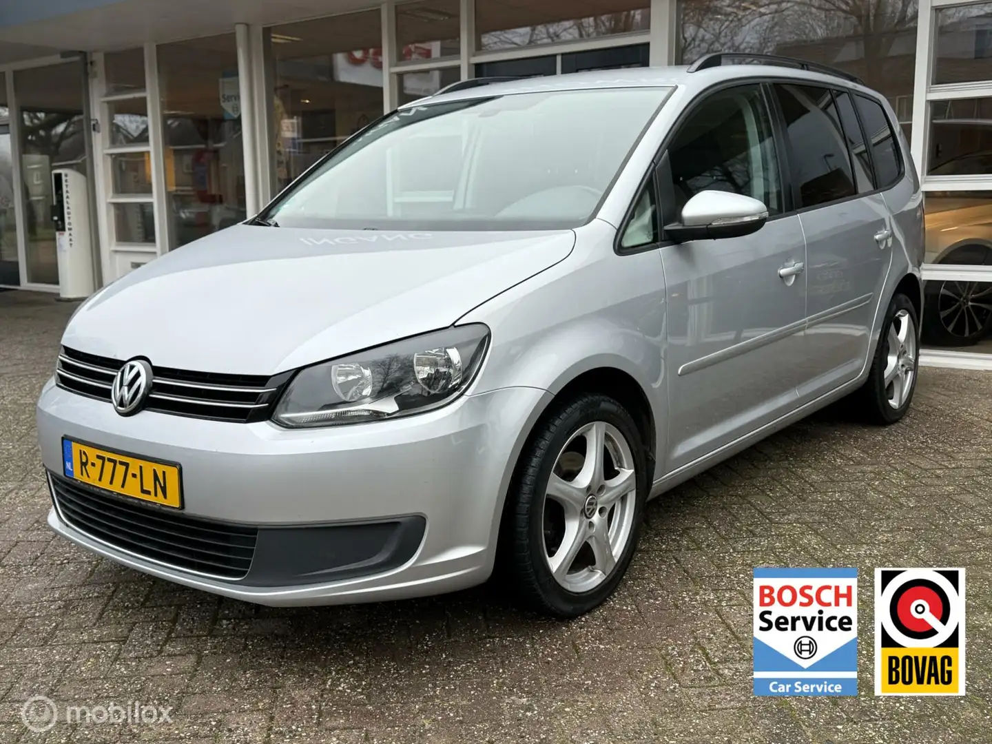 Volkswagen Touran 1.4 TSI Comfortline 7p. Navi, Climat, Cruise, Pdc, Grau - 1