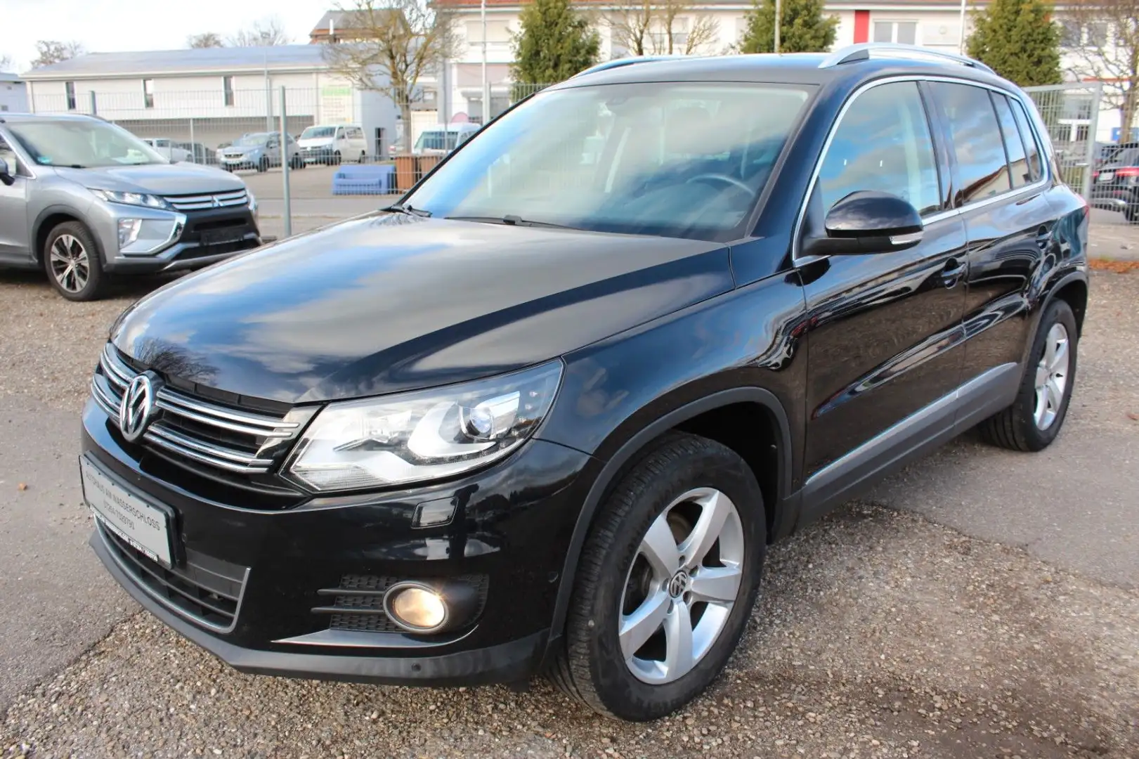Volkswagen Tiguan Sport & Style 4Motion*DSG*NAVI*KAMERA*1Hd Schwarz - 1