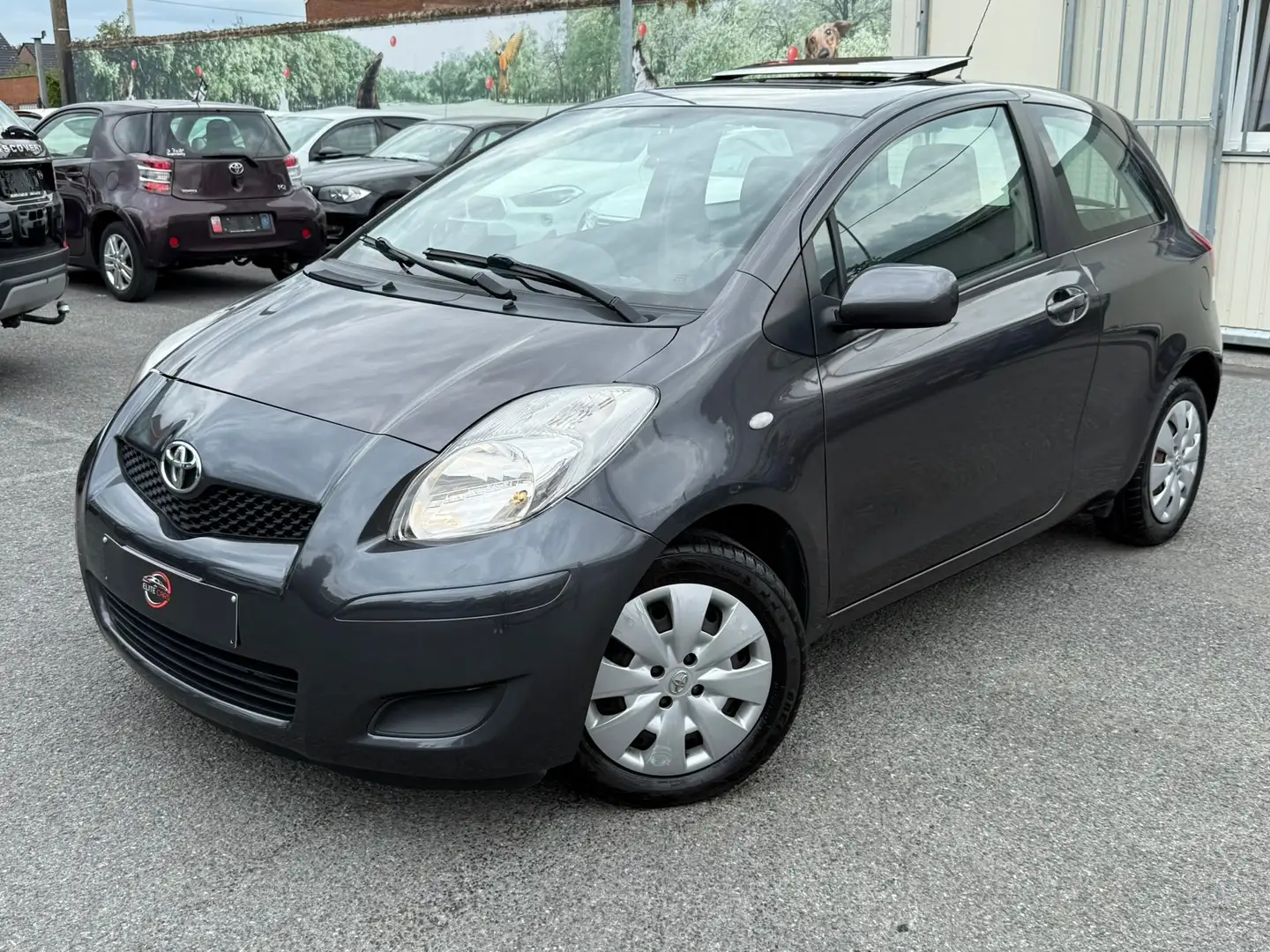 Toyota Yaris 1.33i VVT-i / TOIT OUVRANT / 6 VITESSES / GPS Gris - 1