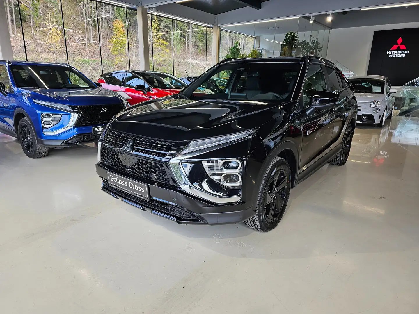 Mitsubishi Eclipse Cross 2,4 PHEV 4WD 45 Jahre Edition CVT Aut. Schwarz - 1