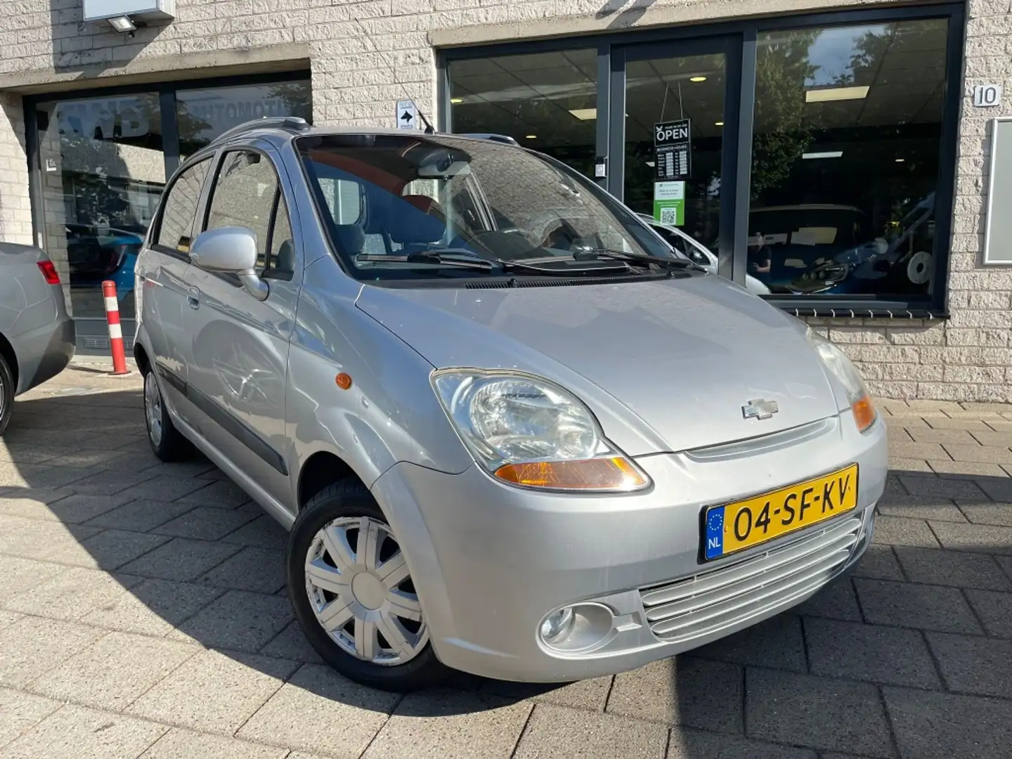 Chevrolet Matiz 1.0 5Deurs Airco Nap Apk Distr VV Grijs - 1