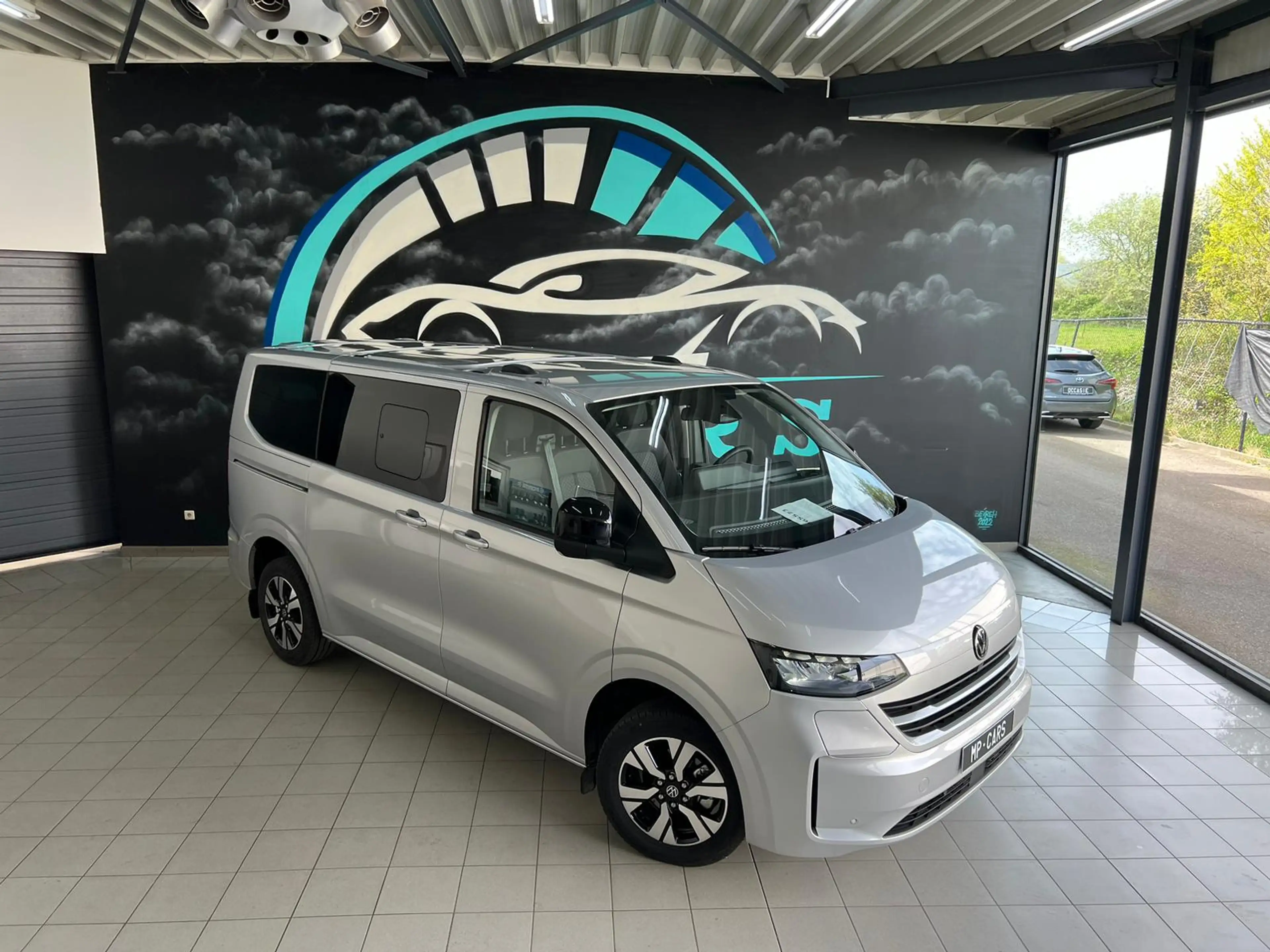 Volkswagen T7 Caravelle E-Caravelle — photo 4