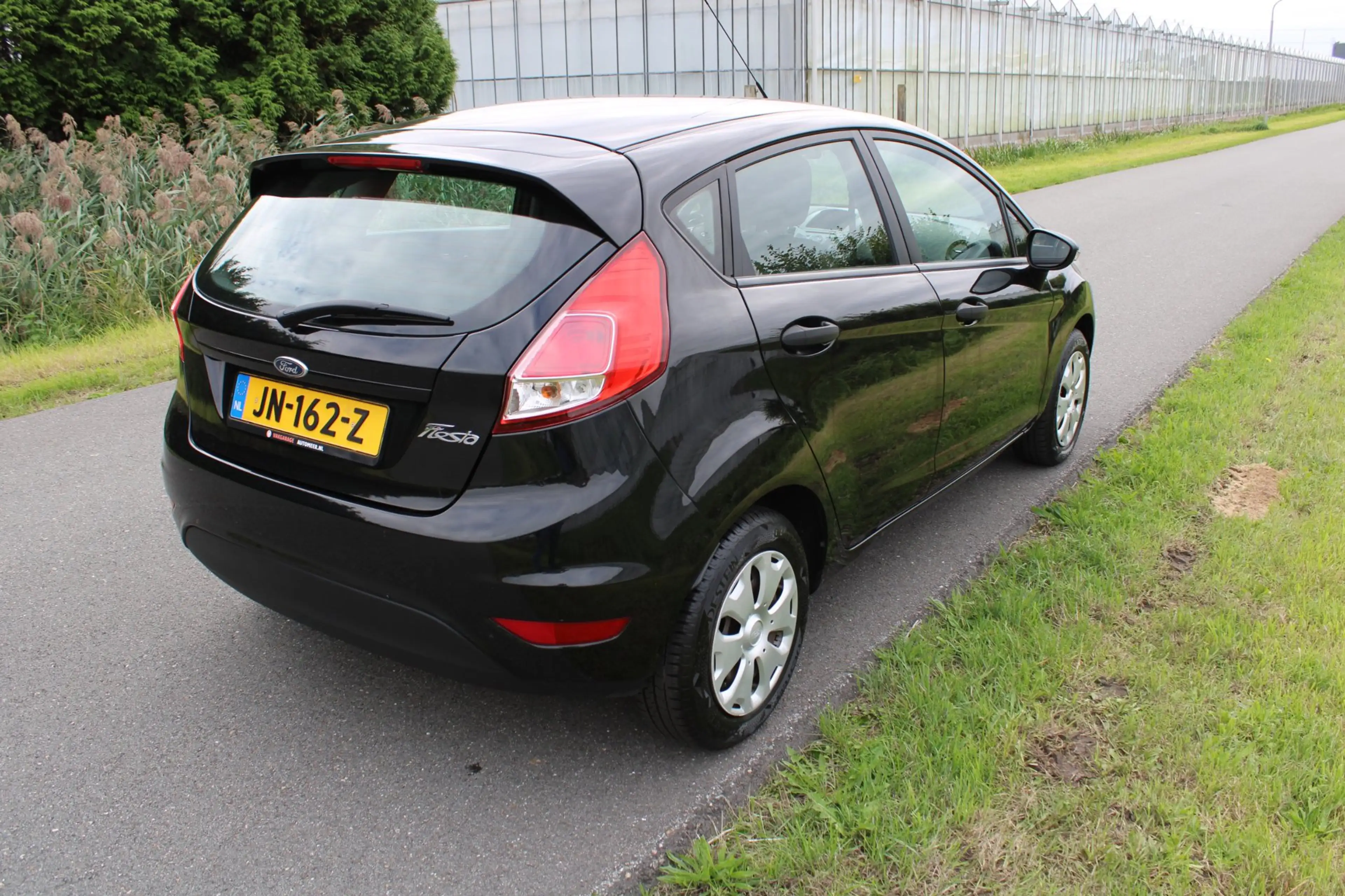 Ford Fiesta 1.25 5 Drs met Airco — photo 5