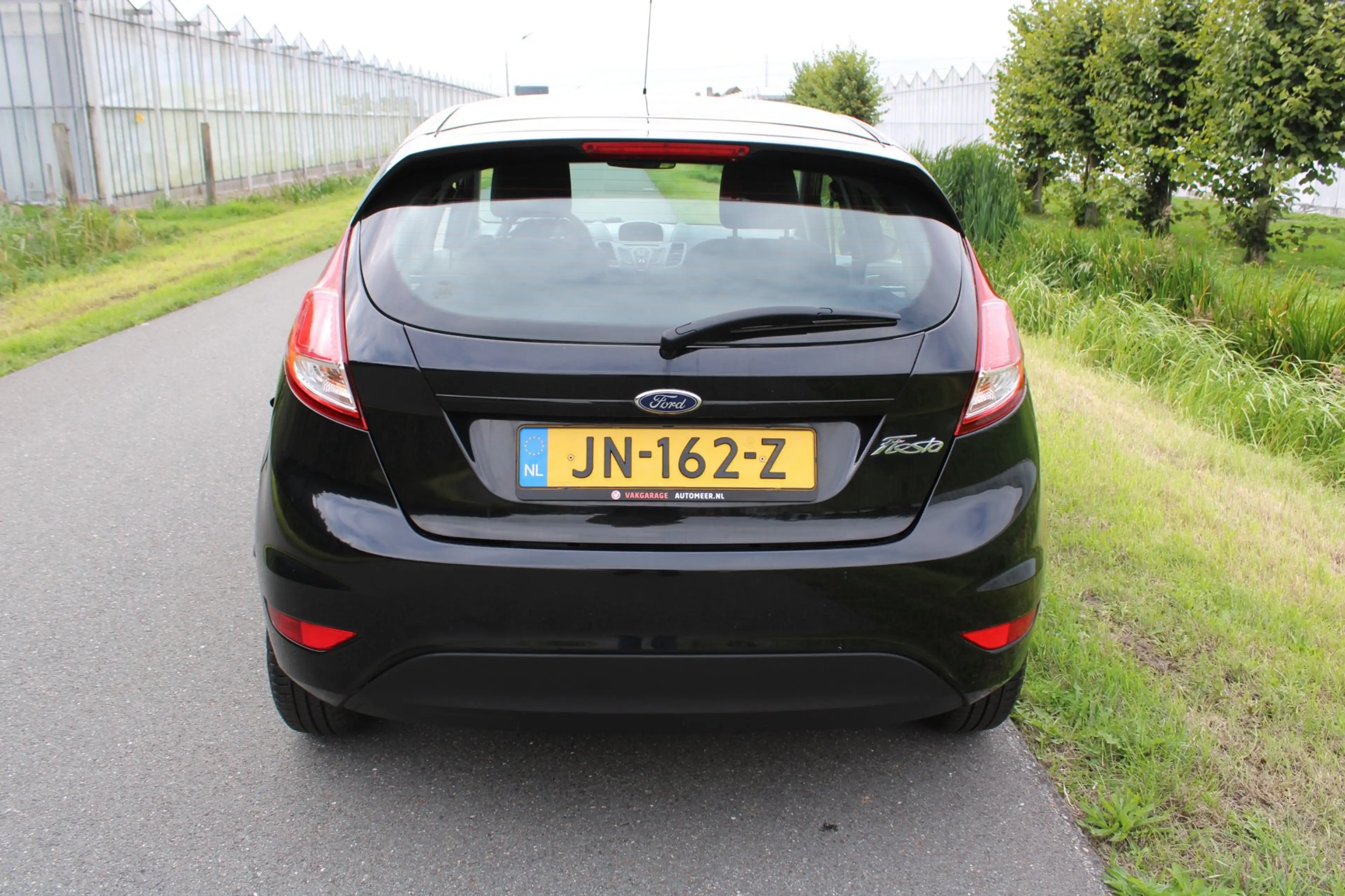Ford Fiesta 1.25 5 Drs met Airco — photo 7