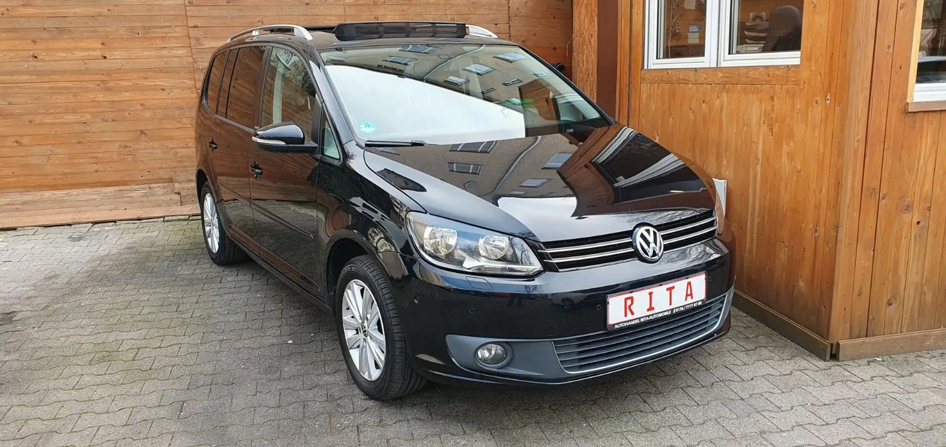 Volkswagen Touran 1.4 TSI EcoFuel Style, Panoramma, SHZ Zwart - 1