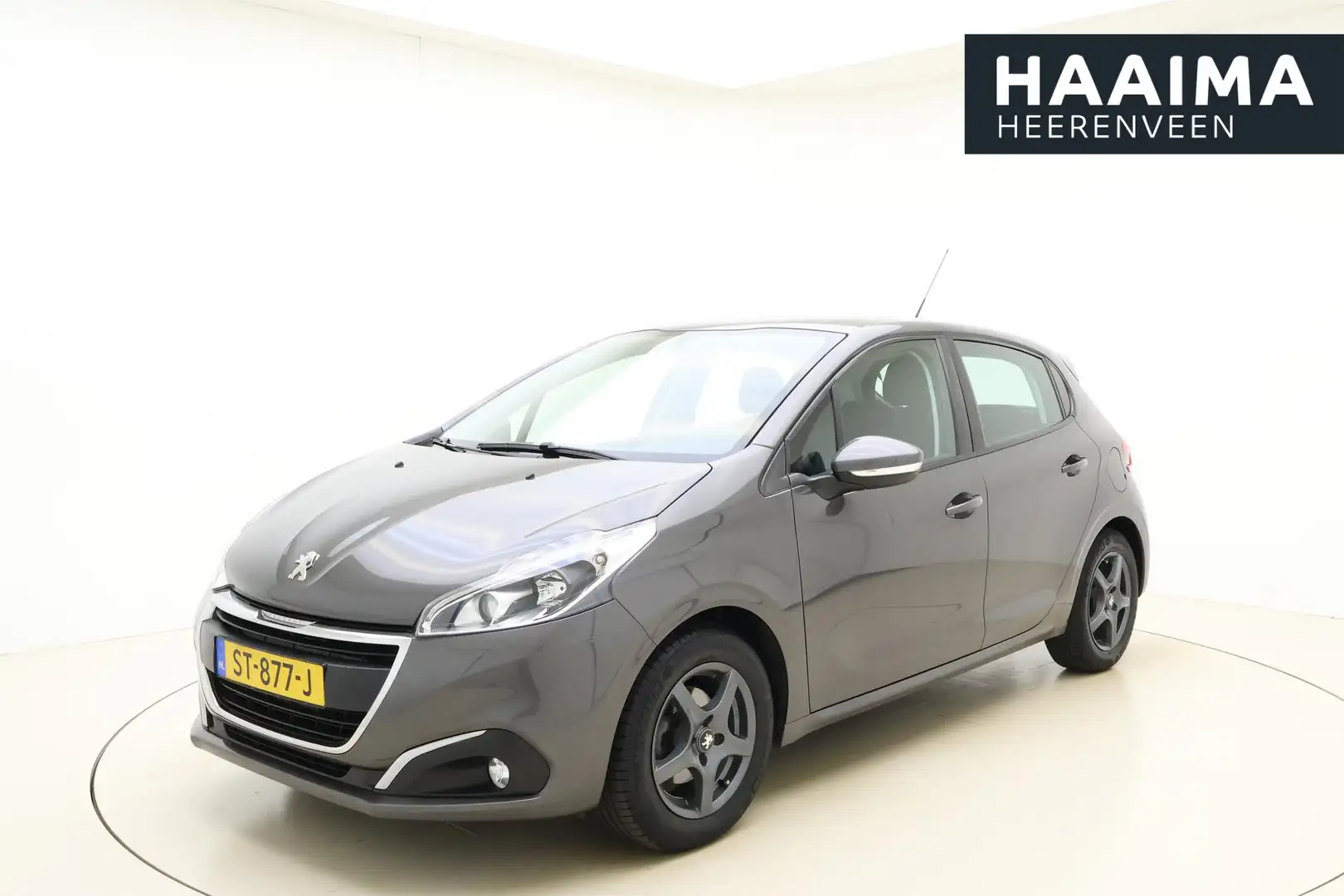 Peugeot 208 1.2 PureTech Blue Lion 82 pk | Trekhaak | Navigati Grijs - 1