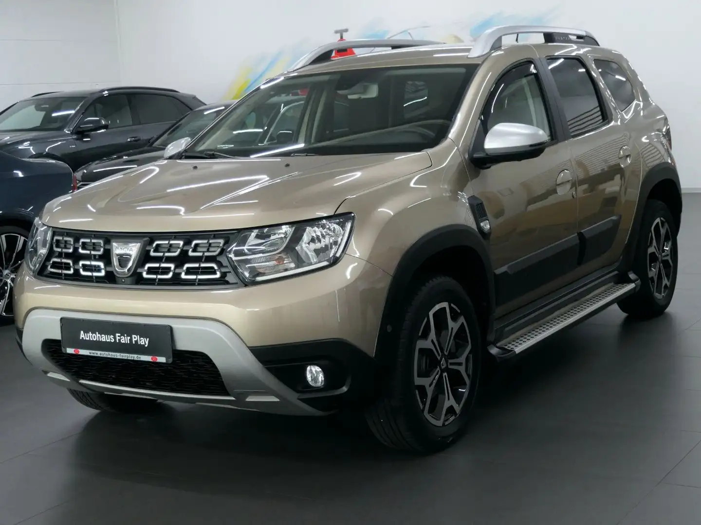 Dacia Duster II 1.5 Prestige NAVI/AHK/360°/1.HD/U-FREI Beige - 1