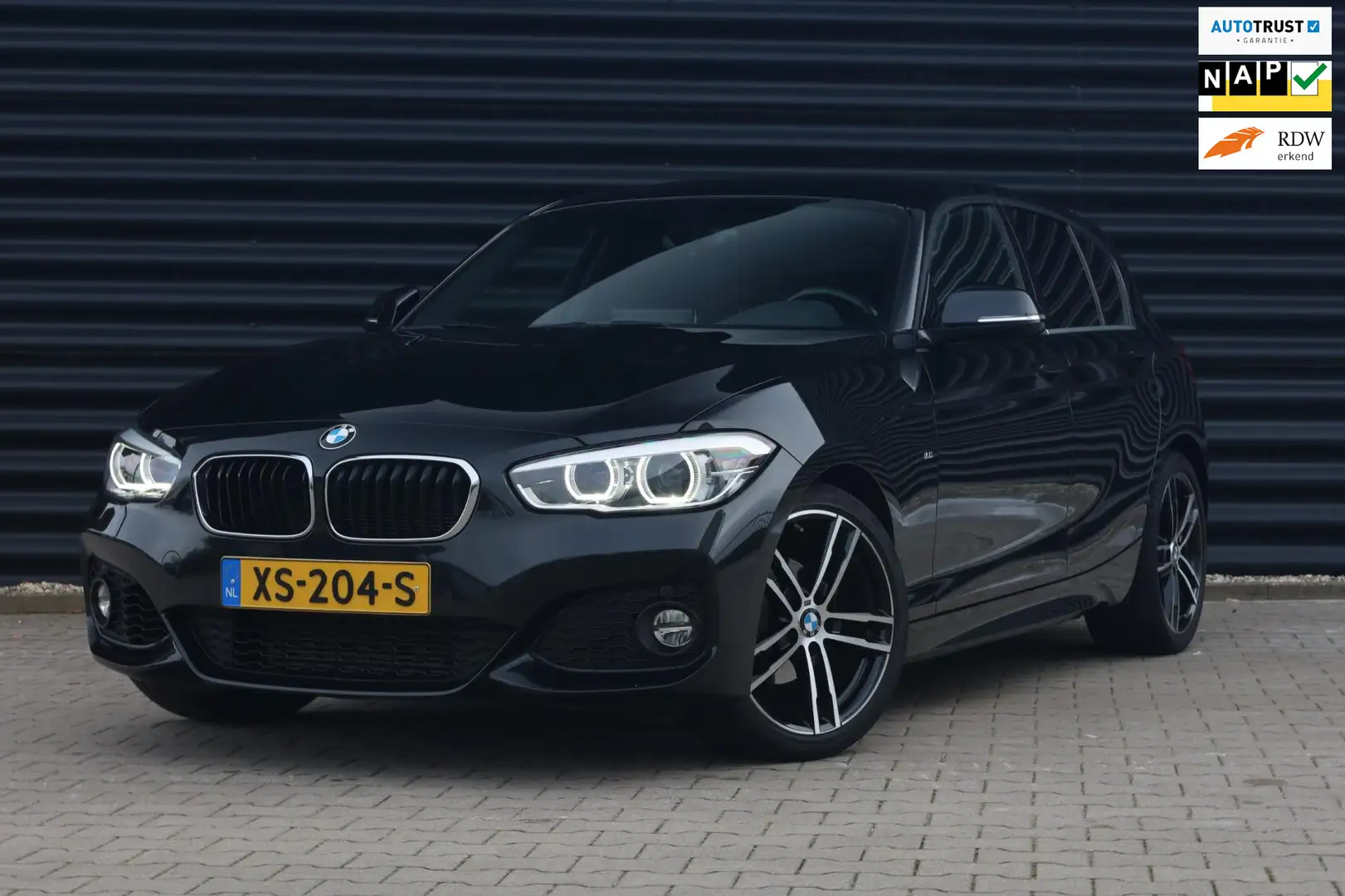BMW 118 1-serie 118i High Executive M Sport / CARPLAY / LE Schwarz - 1