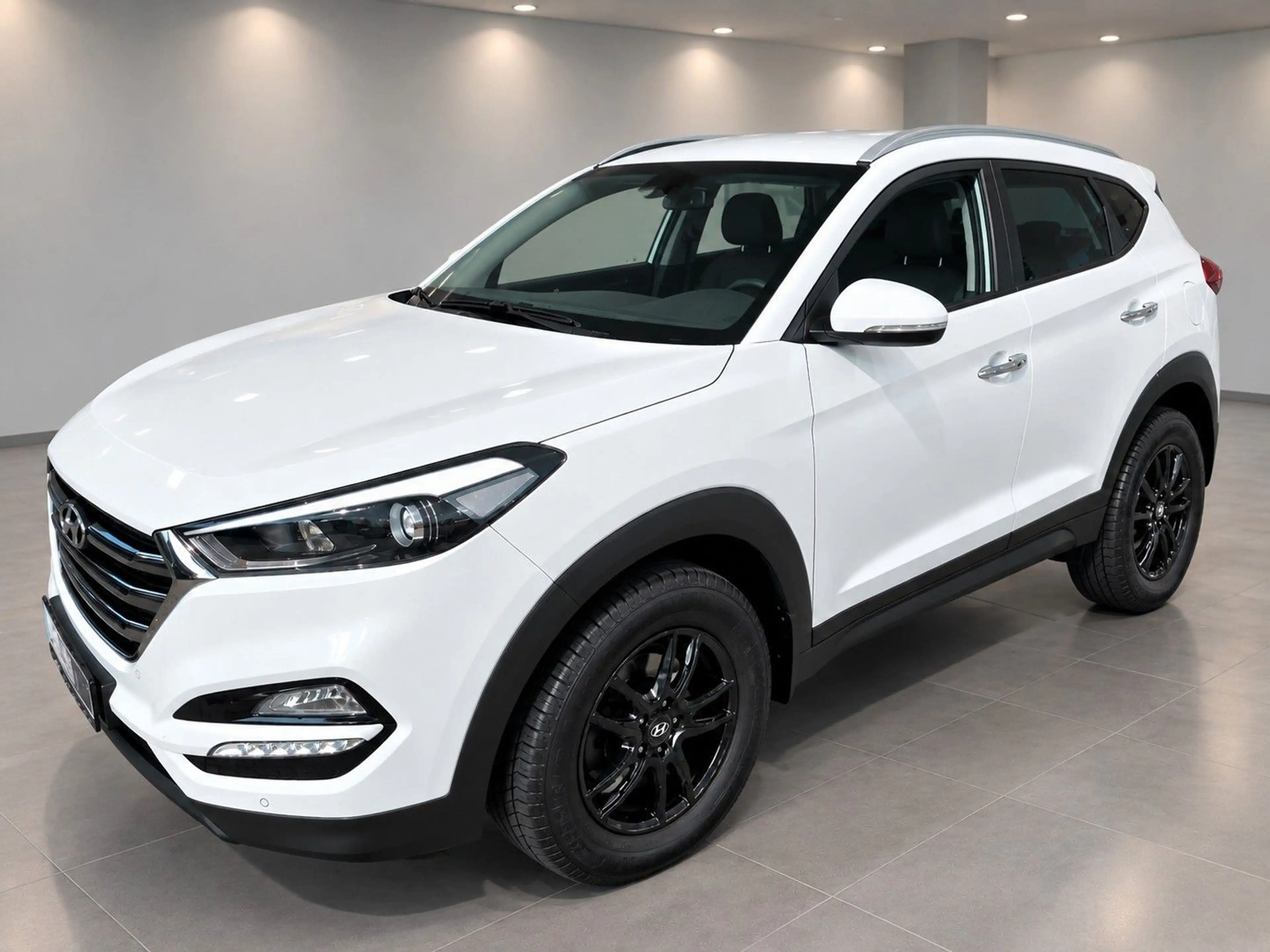 Hyundai TUCSON 1.6 blue Trend 2WD 1.HAND+LEDER+NAVI+KAM+ — photo 2