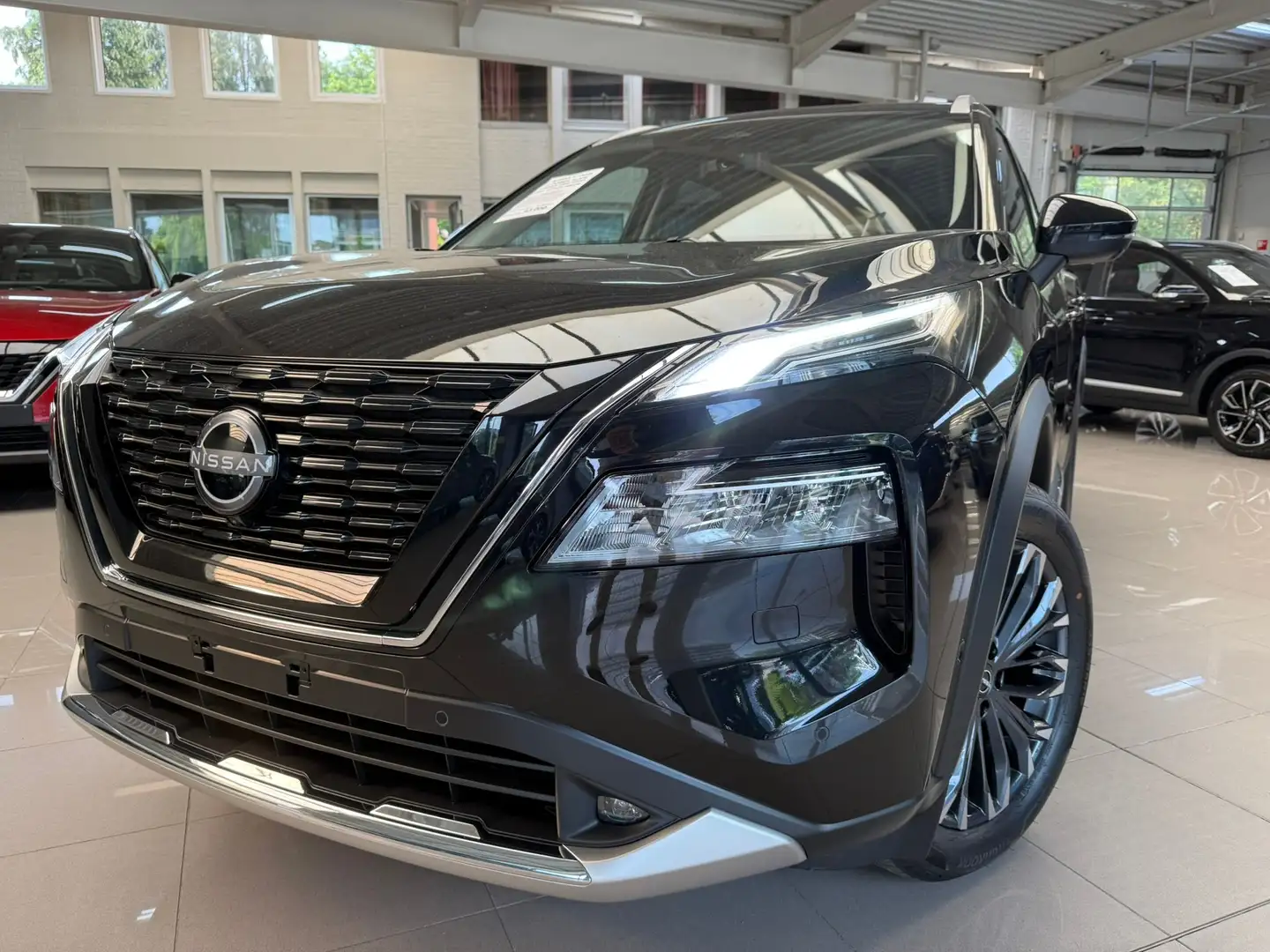 Nissan X-Trail 1.5 e-Power e-4ORCE 4WD Tekna 7pl.+OPEN DAK-NIEUW Zwart - 1