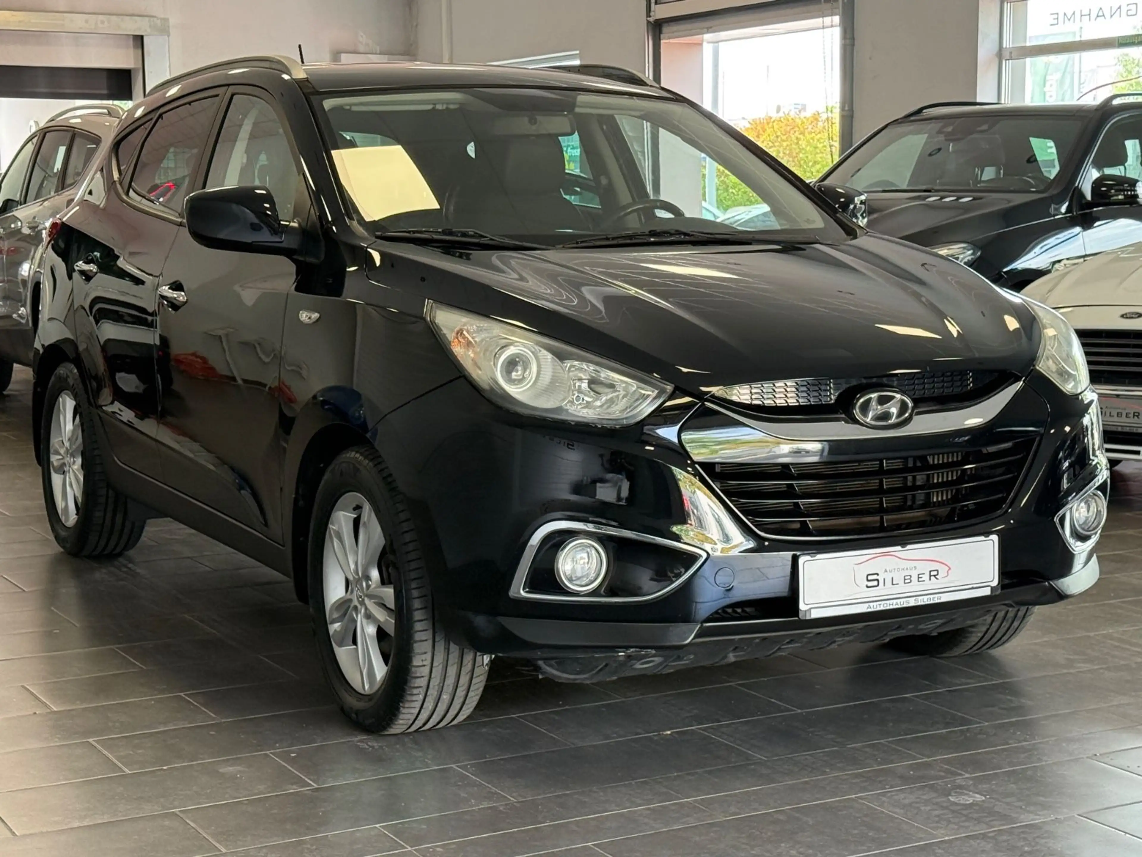 Hyundai iX35 Style AWD Automatik/Sitzheizung/PDC/Leder — photo 2