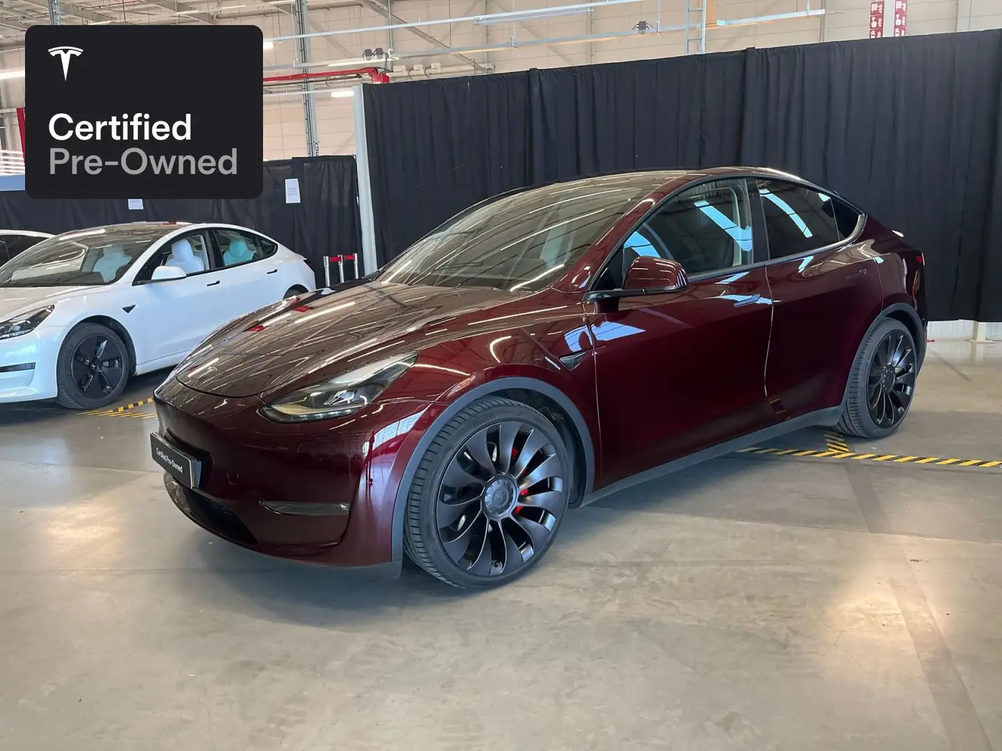 Tesla Model Y Performance “Certified Pre-Owned” Rood - 1