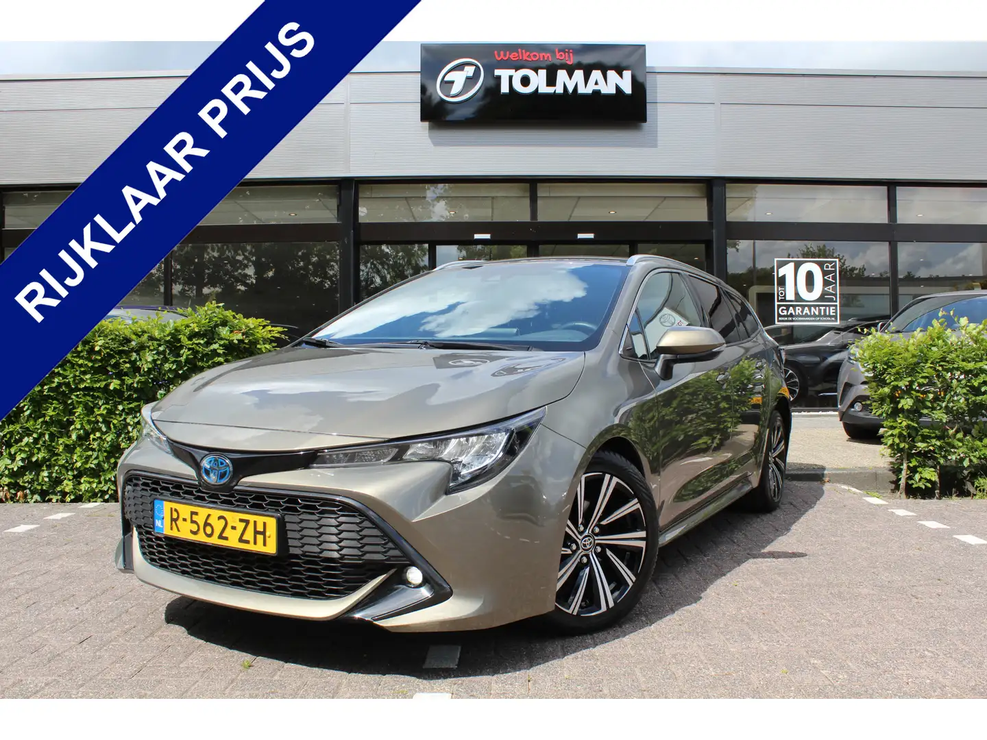 Toyota Corolla Touring Sports 1.8 Hybrid Business Plus | Rijklaar Grün - 1