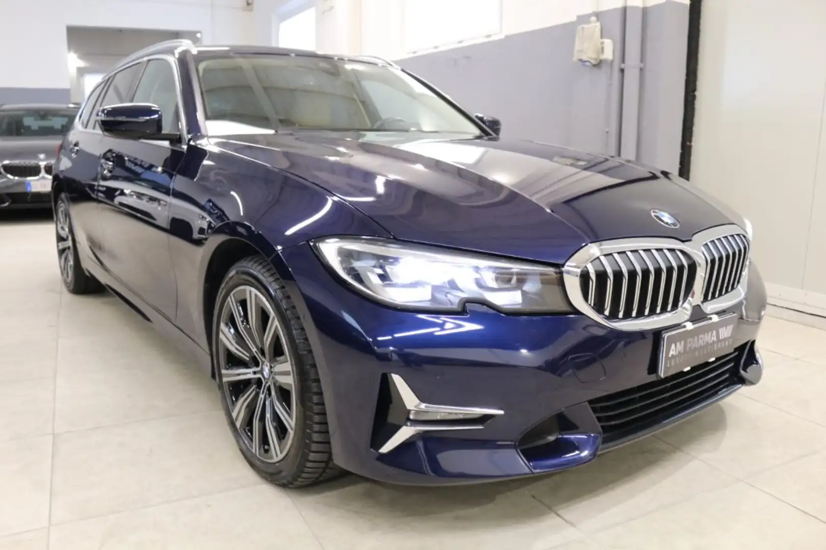 BMW 320 d 48V xDrive Touring Luxury Bleu - 1