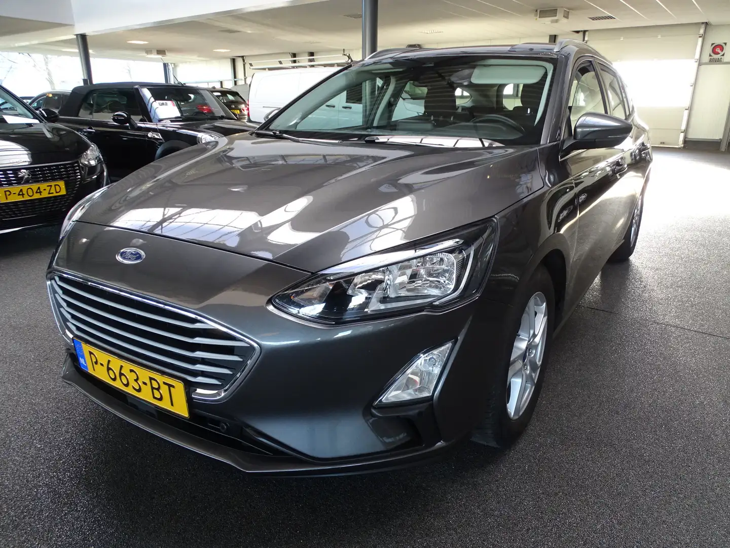 Ford Focus Wagon 1.0 EcoBoost Hybrid Navi, Apple carplay, Cru Grijs - 1
