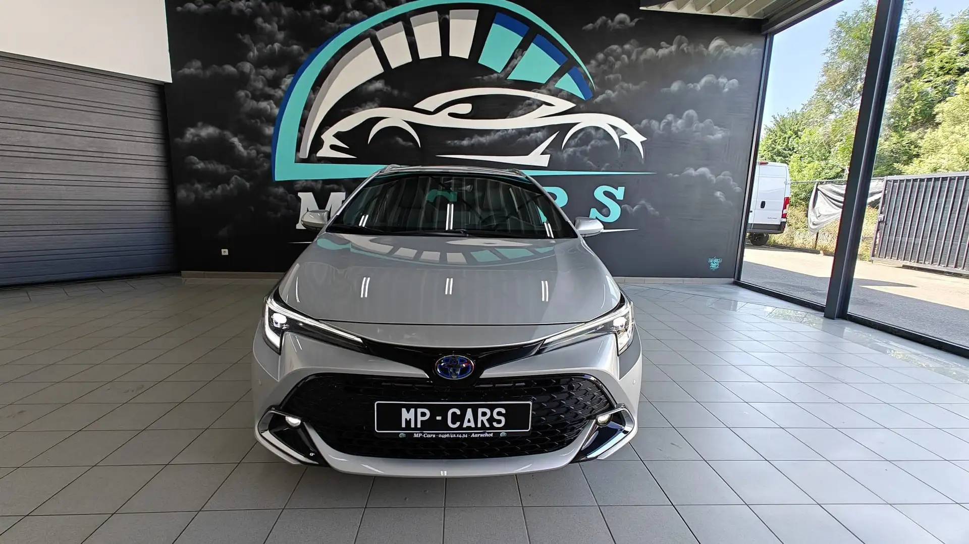 Toyota Corolla TS Hybrid 2.0 style + tech pack e-CVT Zilver - 1