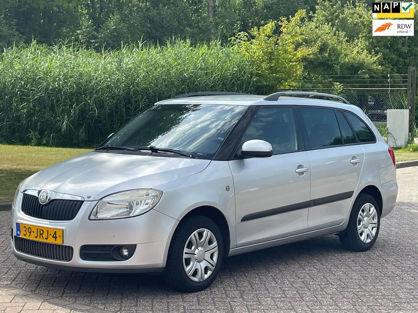 Skoda Fabia Combi 1.2-12V Tour/AIRCO/CRUISE/PARKEERSENS ACHTER Grijs - 1