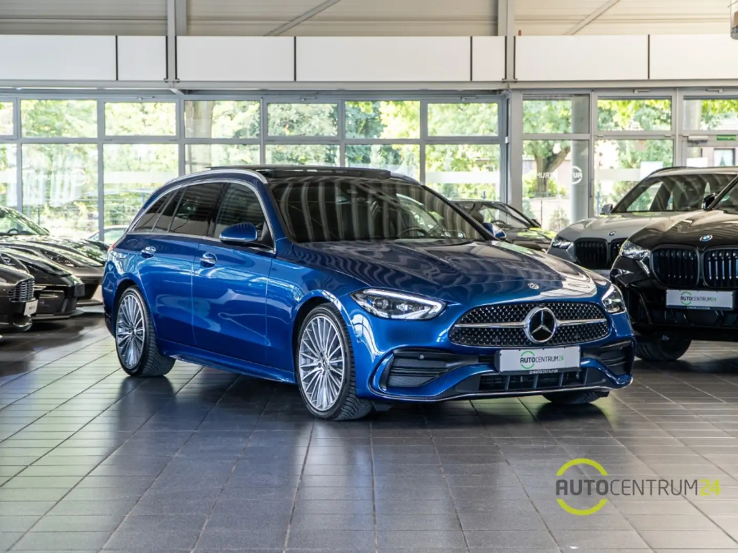 Mercedes-Benz C 300 d T-Moddell AMG Pano Burmester AHK Digital Blauw - 1