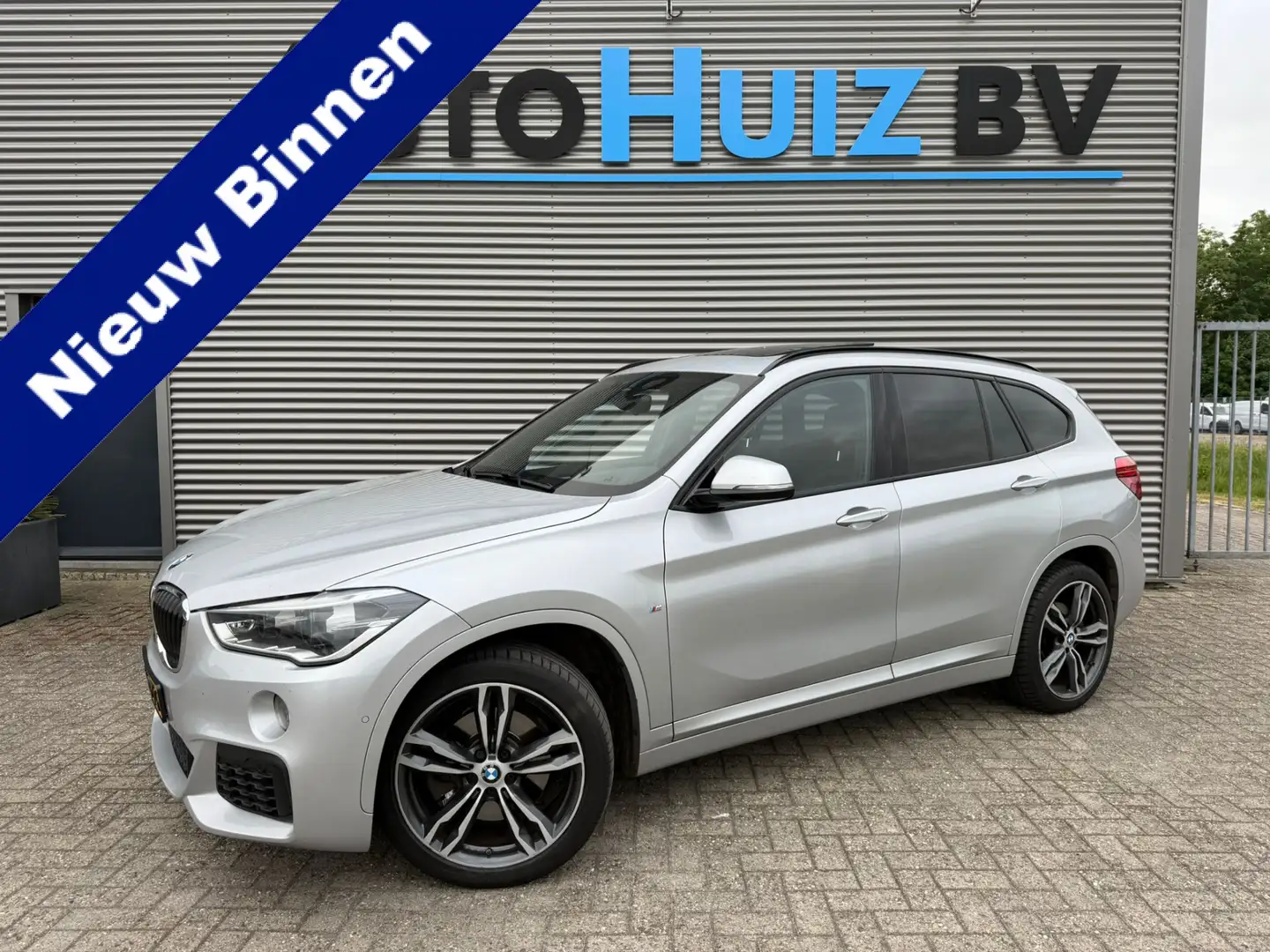 BMW X1 xDrive25i High Executive M Sport Leer Panoramadak Grau - 1