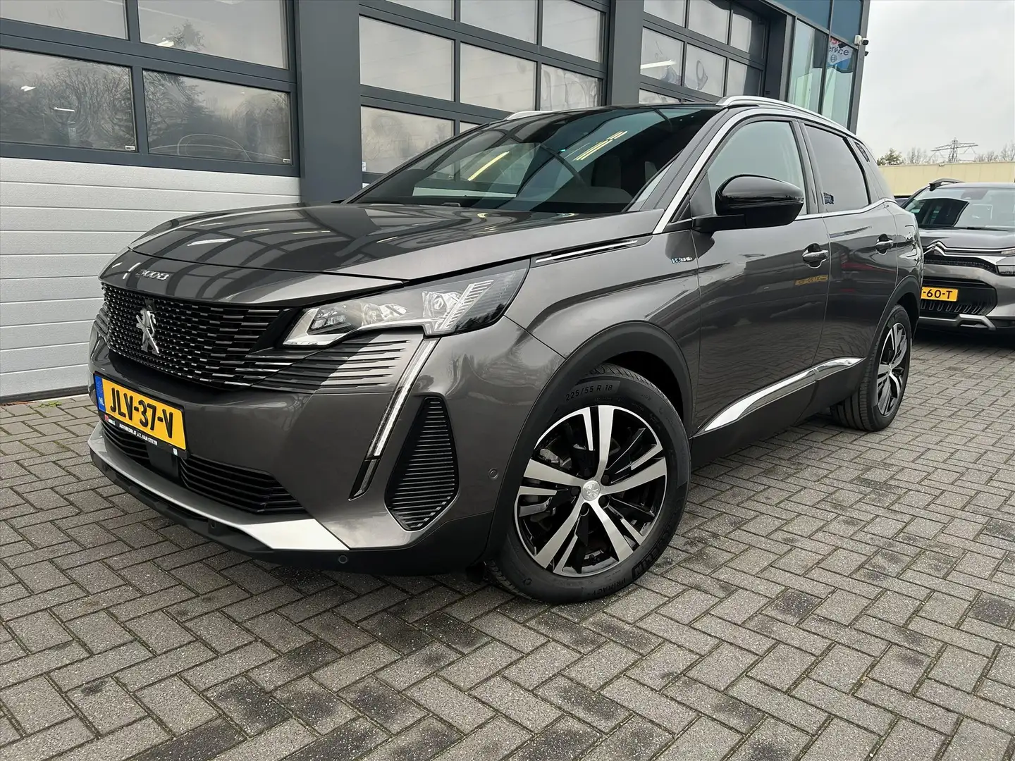 Peugeot 3008 PHEV 225pk GT, Carplay, Pano, Camera, Stoelverwarm Grijs - 1